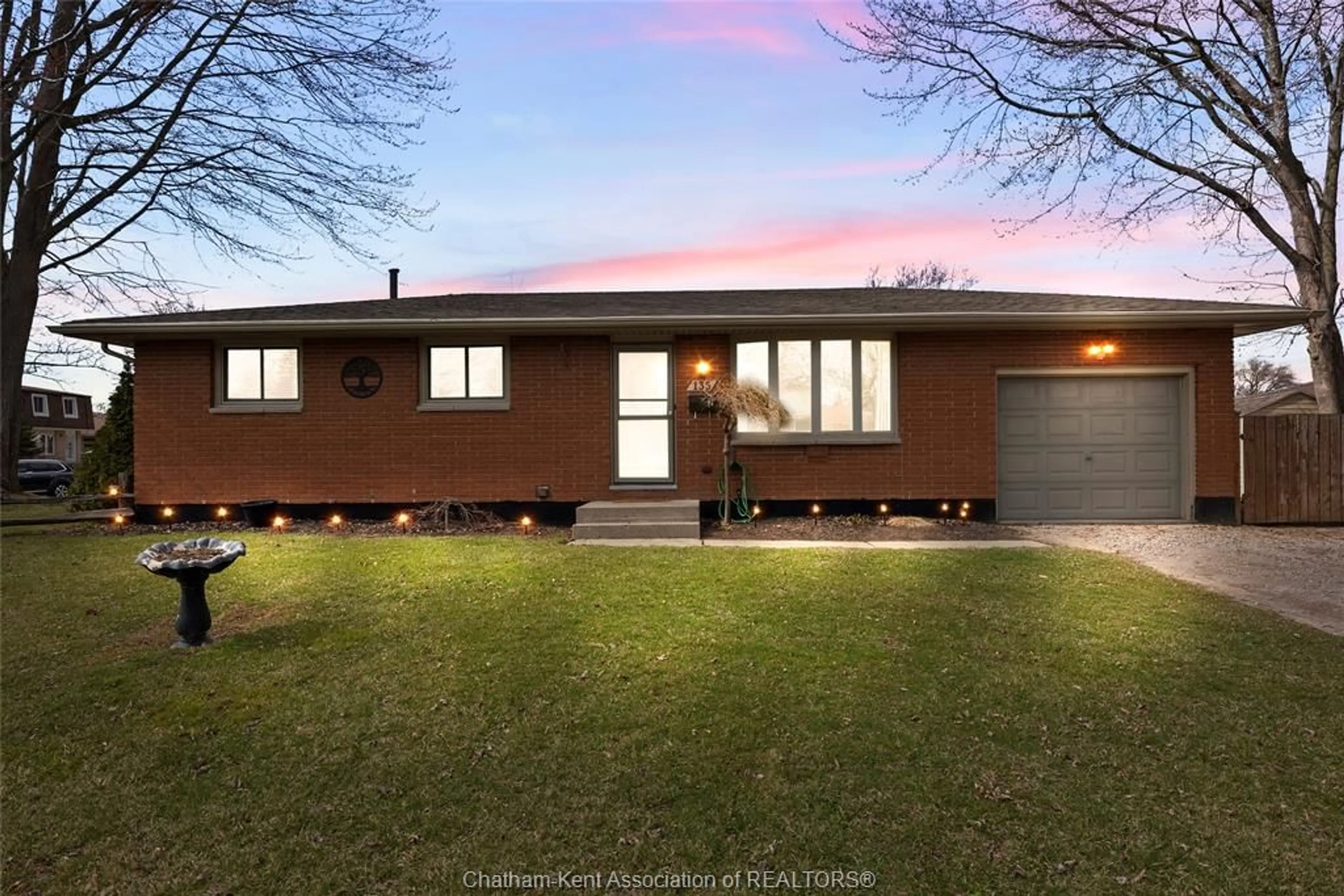 Home with brick exterior material, street for 135 Berry St, Chatham Ontario N7M 3B2