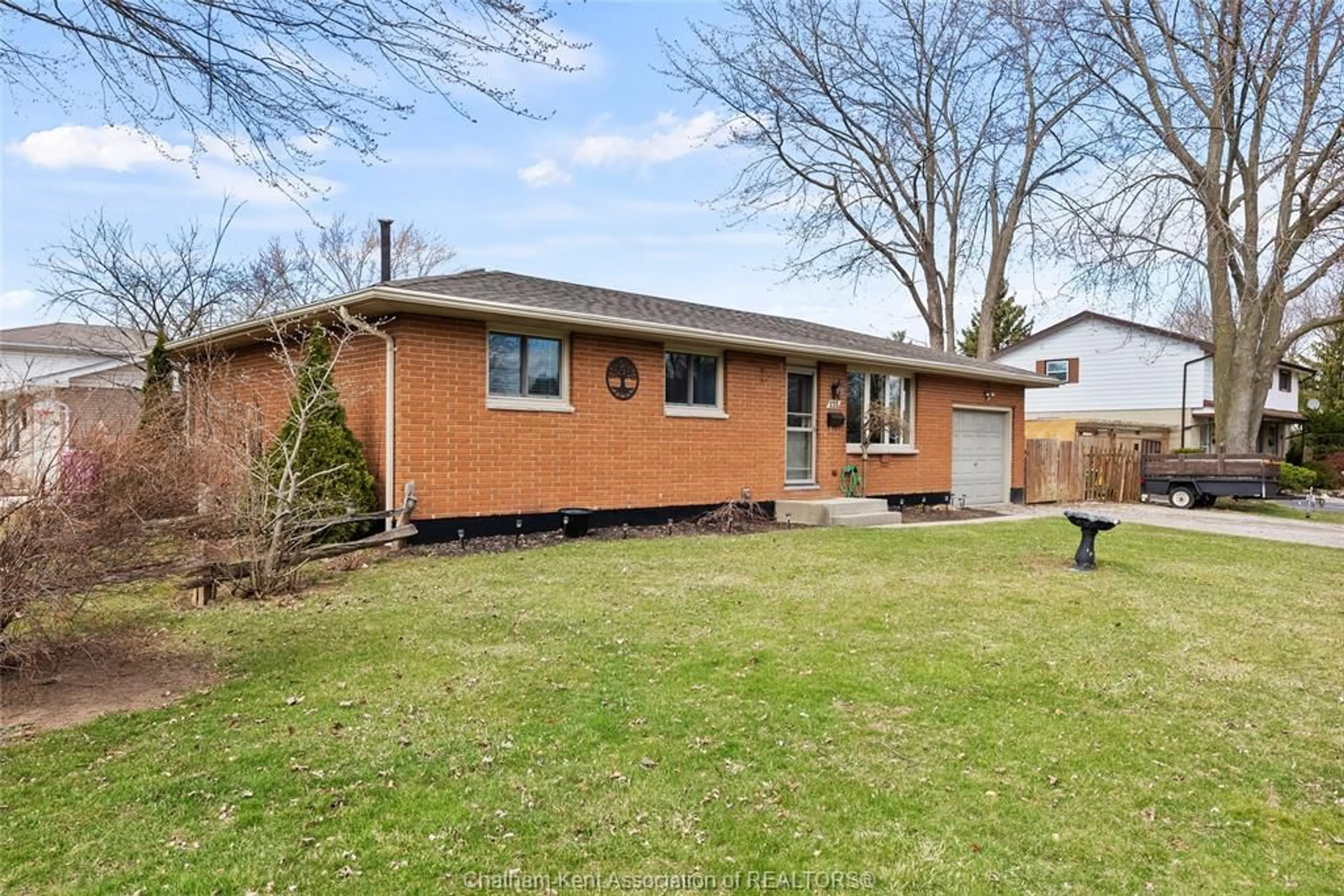 Home with brick exterior material, street for 135 Berry St, Chatham Ontario N7M 3B2