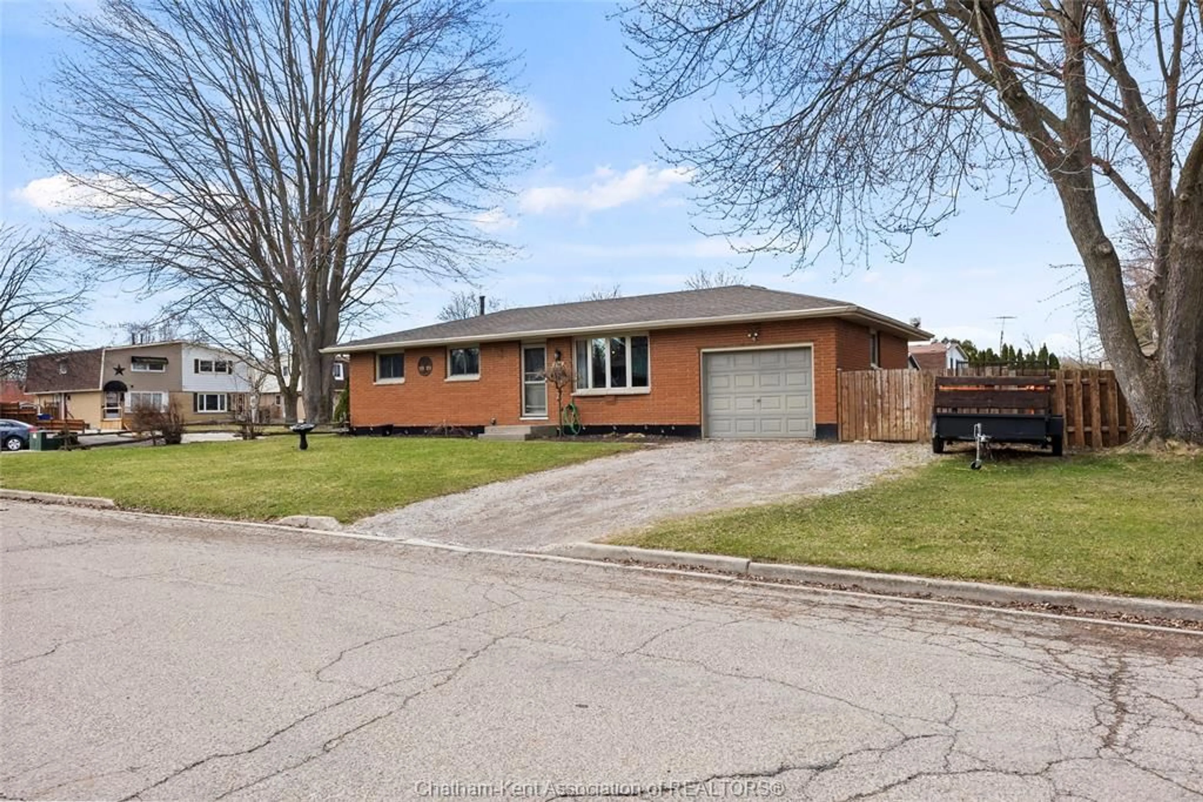 Home with brick exterior material, street for 135 Berry St, Chatham Ontario N7M 3B2