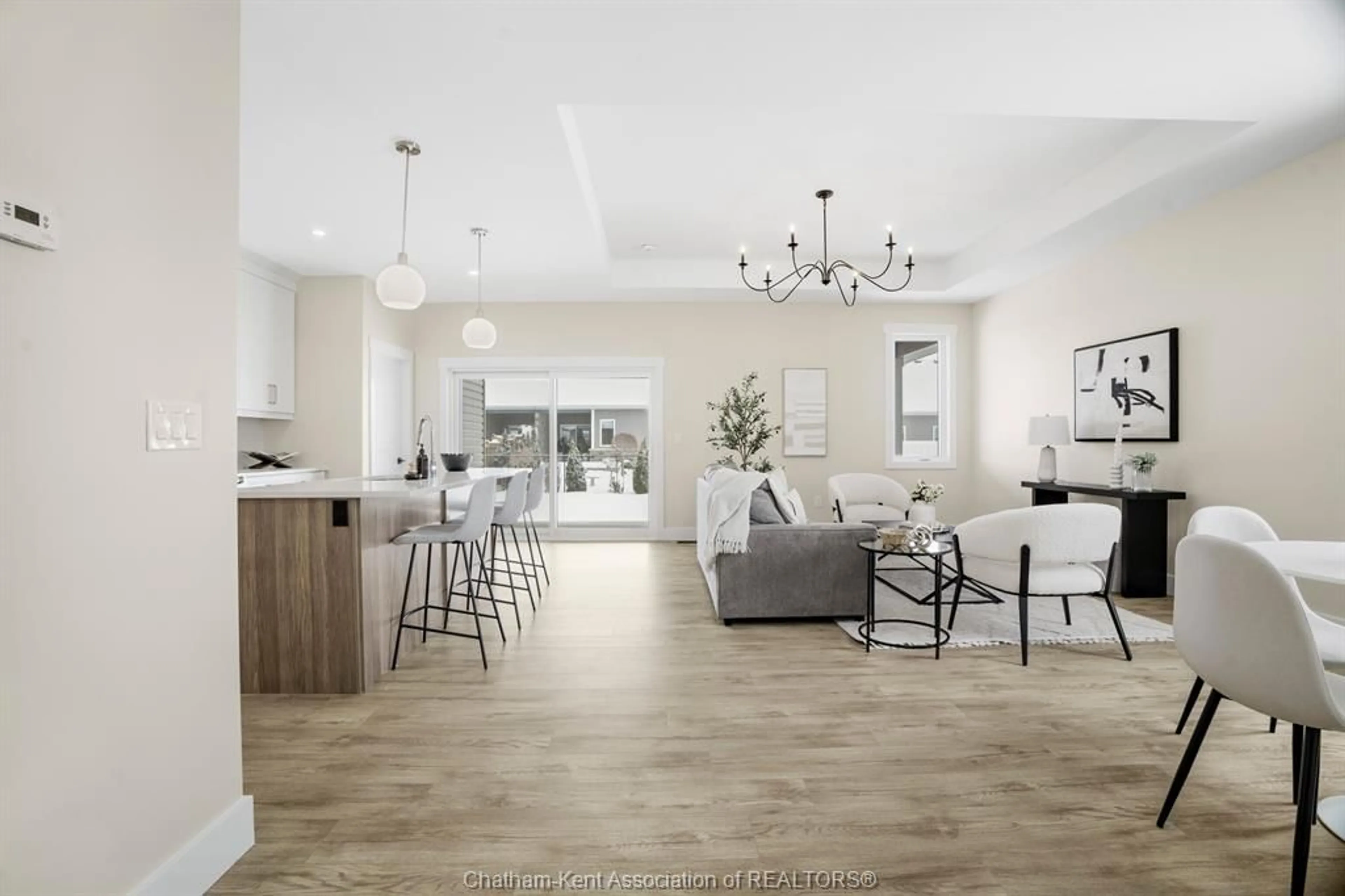 Open concept kitchen, wood/laminate floor for 32 Duskridge Rd, Chatham Ontario N7L 0G7
