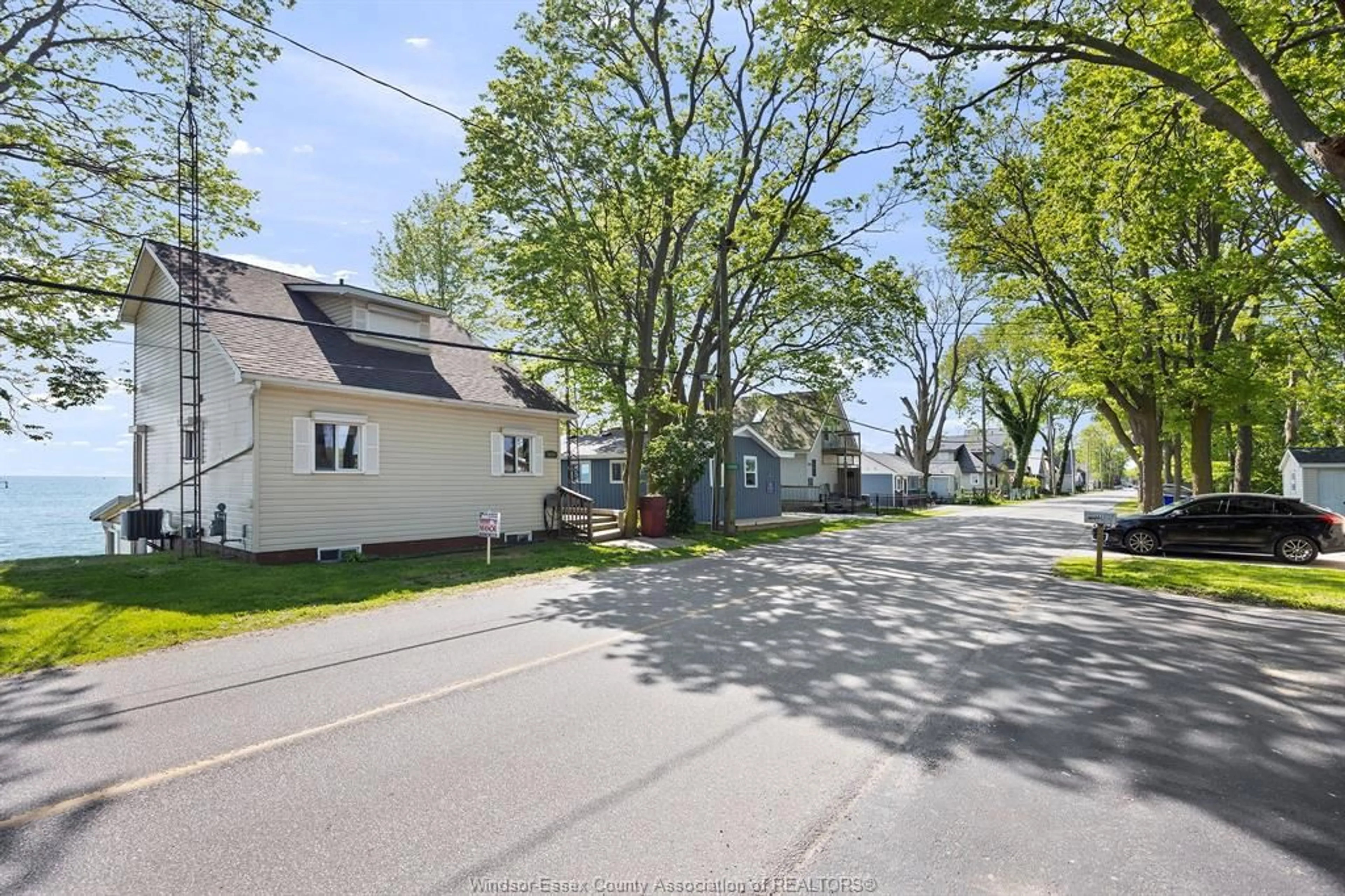 A pic from outside/outdoor area/front of a property/back of a property/a pic from drone, street for 1030 POINT PELEE Dr, Leamington Ontario N8H 3V4