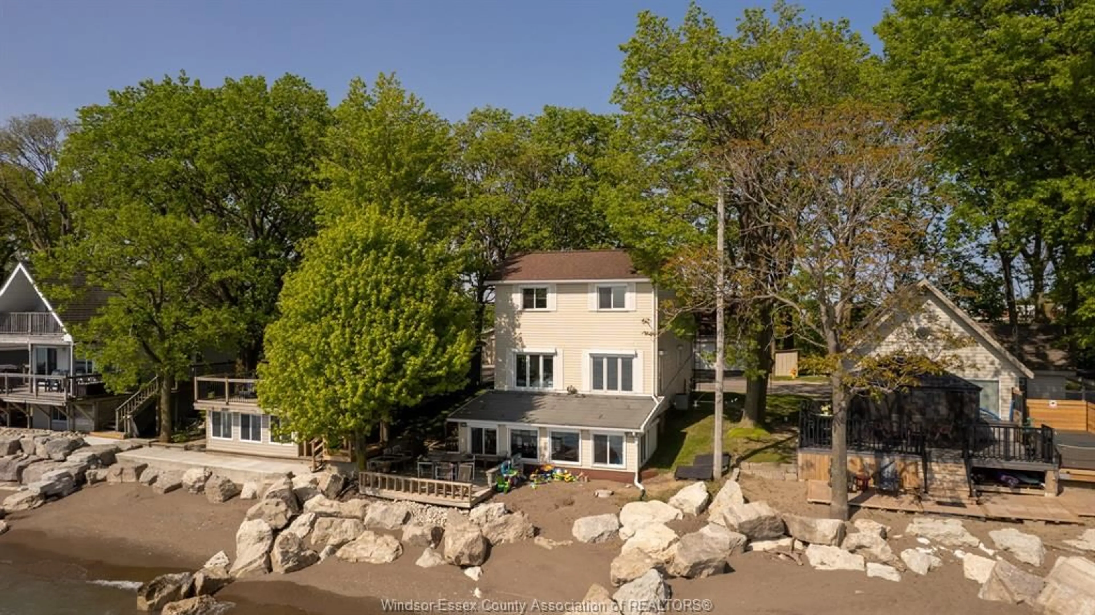 A pic from outside/outdoor area/front of a property/back of a property/a pic from drone, water/lake/river/ocean view for 1030 POINT PELEE Dr, Leamington Ontario N8H 3V4