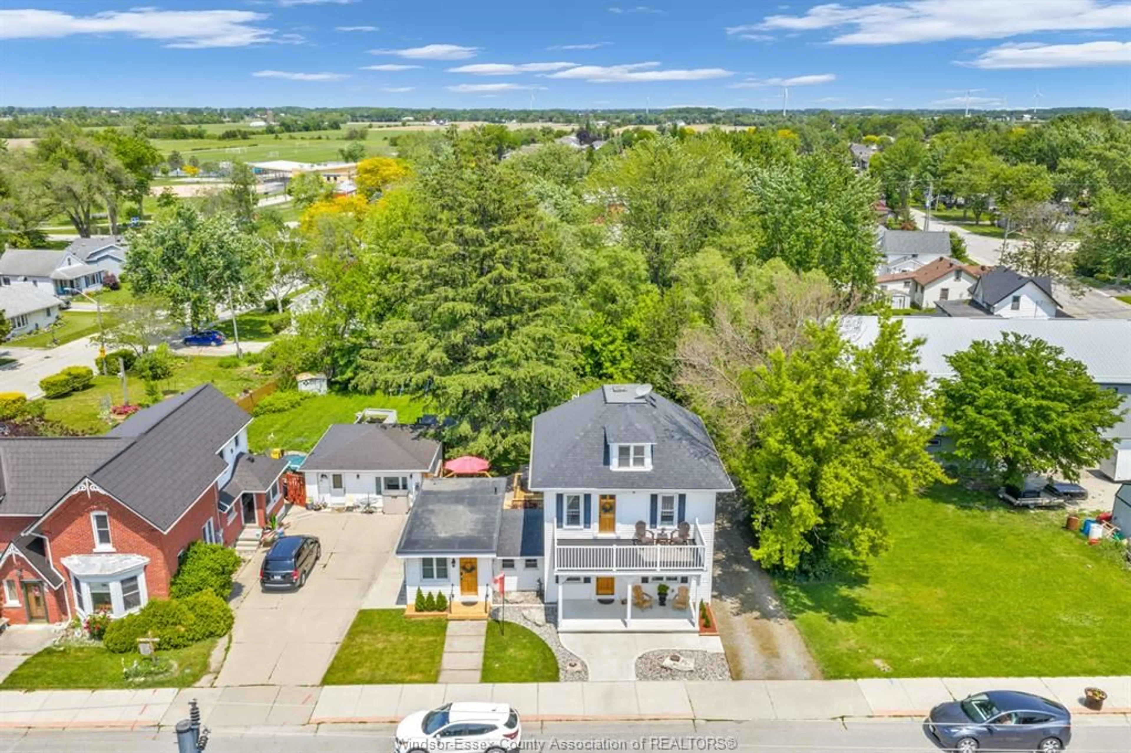 A pic from outside/outdoor area/front of a property/back of a property/a pic from drone, street for 138 COUNTY RD 34, Cottam Ontario N0R 1B0