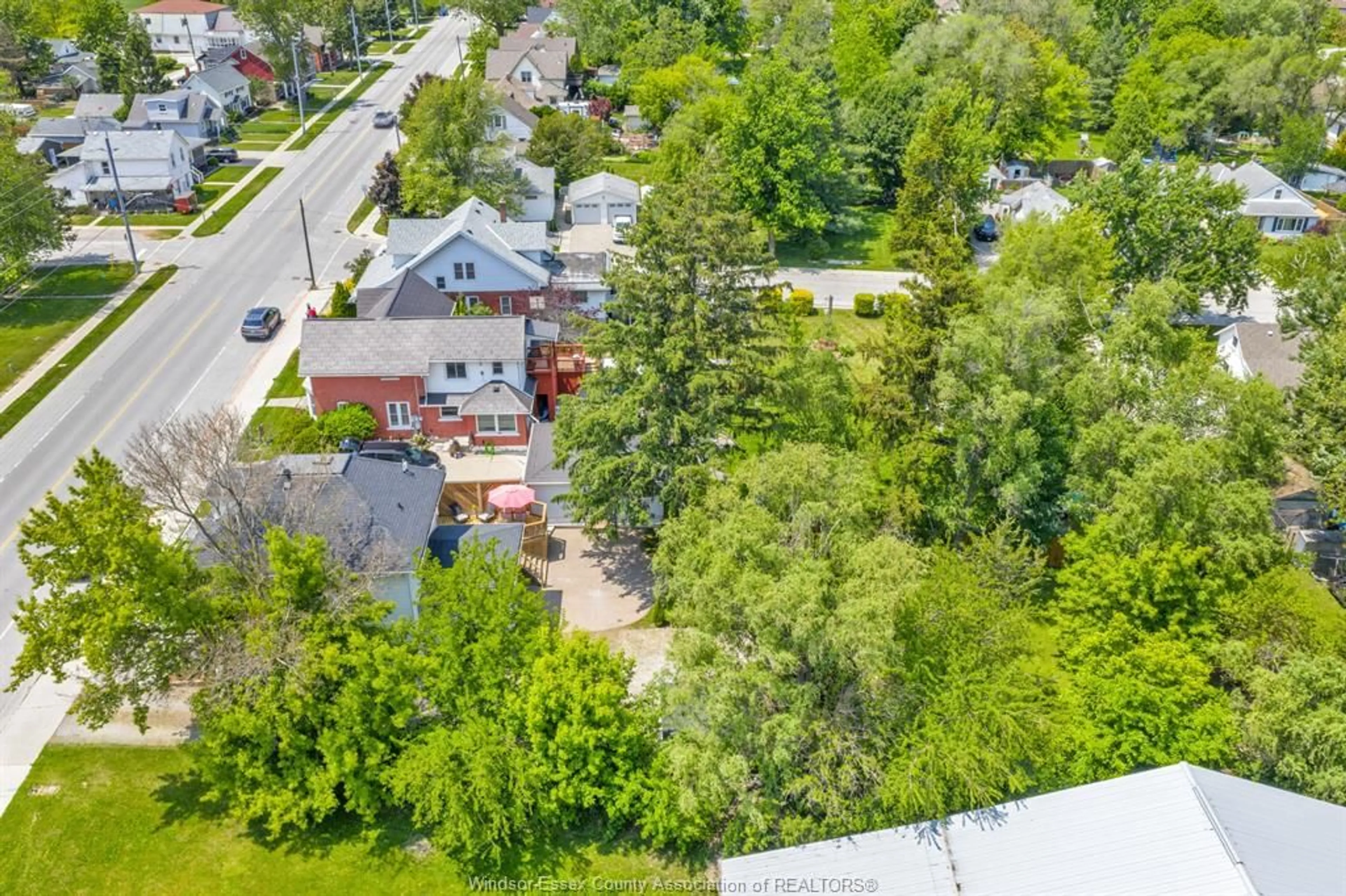 A pic from outside/outdoor area/front of a property/back of a property/a pic from drone, street for 138 COUNTY RD 34, Cottam Ontario N0R 1B0