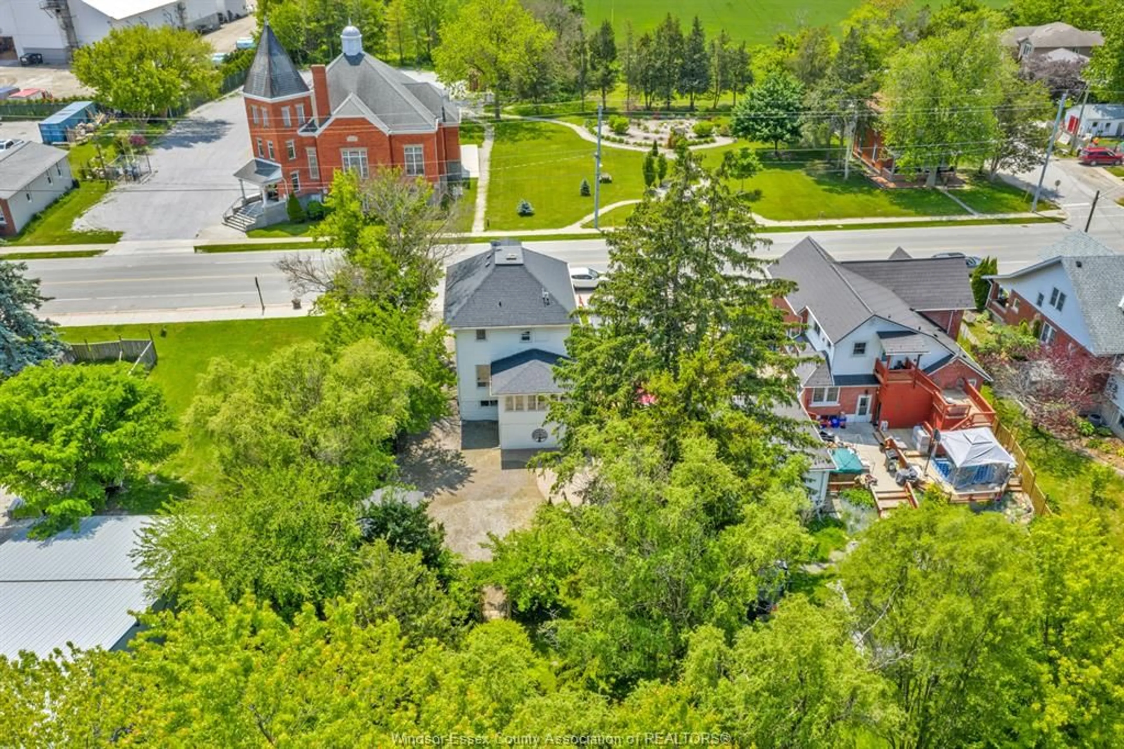 A pic from outside/outdoor area/front of a property/back of a property/a pic from drone, street for 138 COUNTY RD 34, Cottam Ontario N0R 1B0