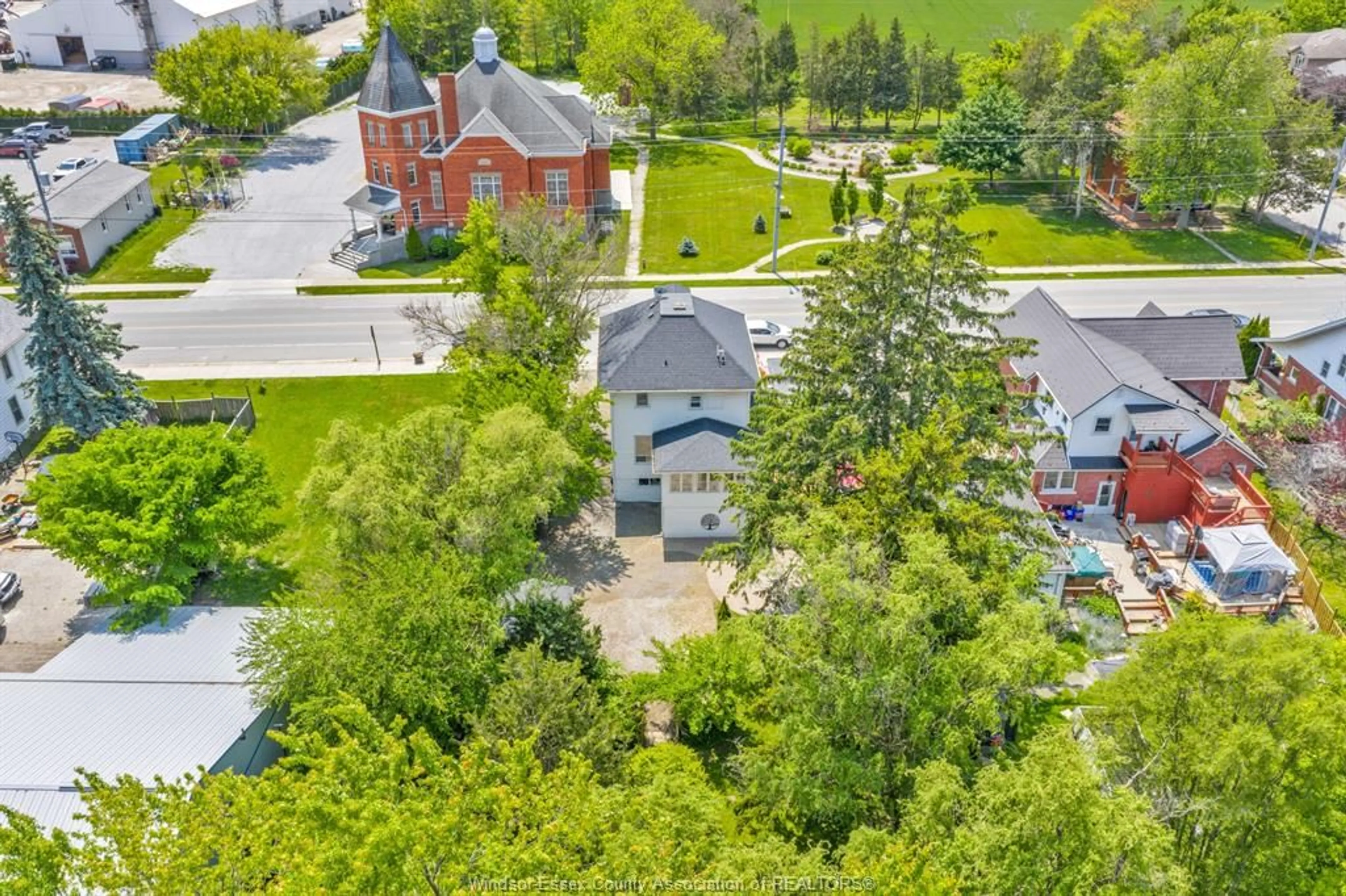 A pic from outside/outdoor area/front of a property/back of a property/a pic from drone, street for 138 COUNTY RD 34, Cottam Ontario N0R 1B0