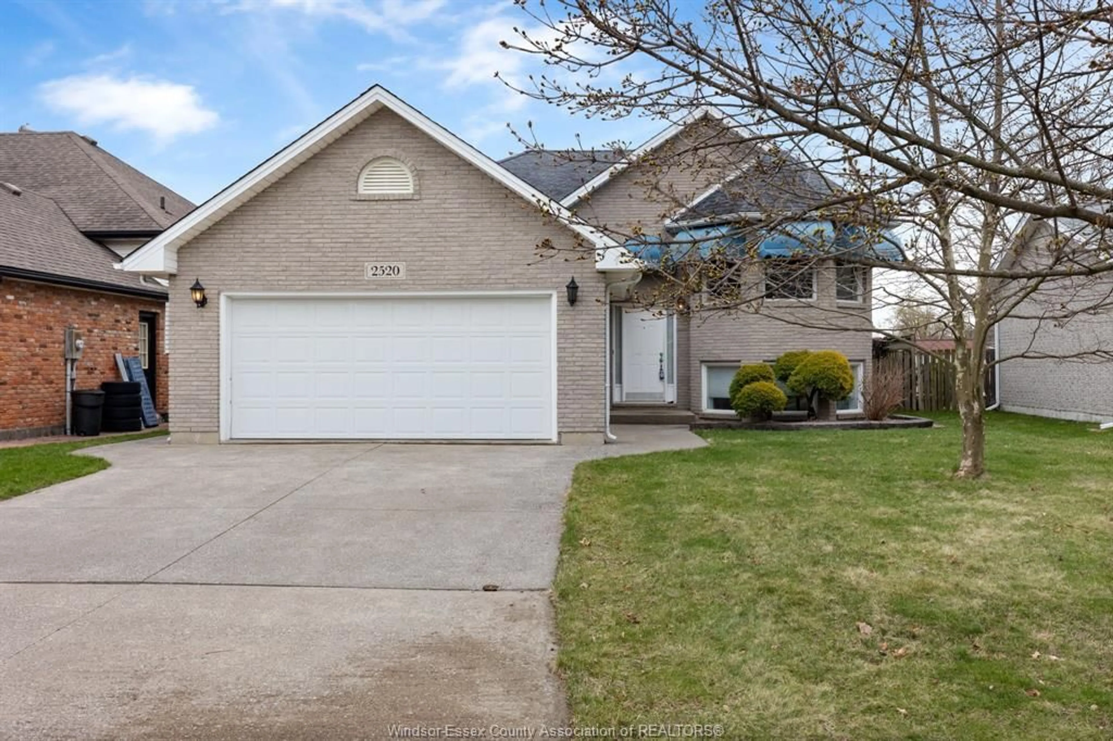 Home with vinyl exterior material, street for 2520 STRAWBERRY, Tecumseh Ontario N9K 1C3
