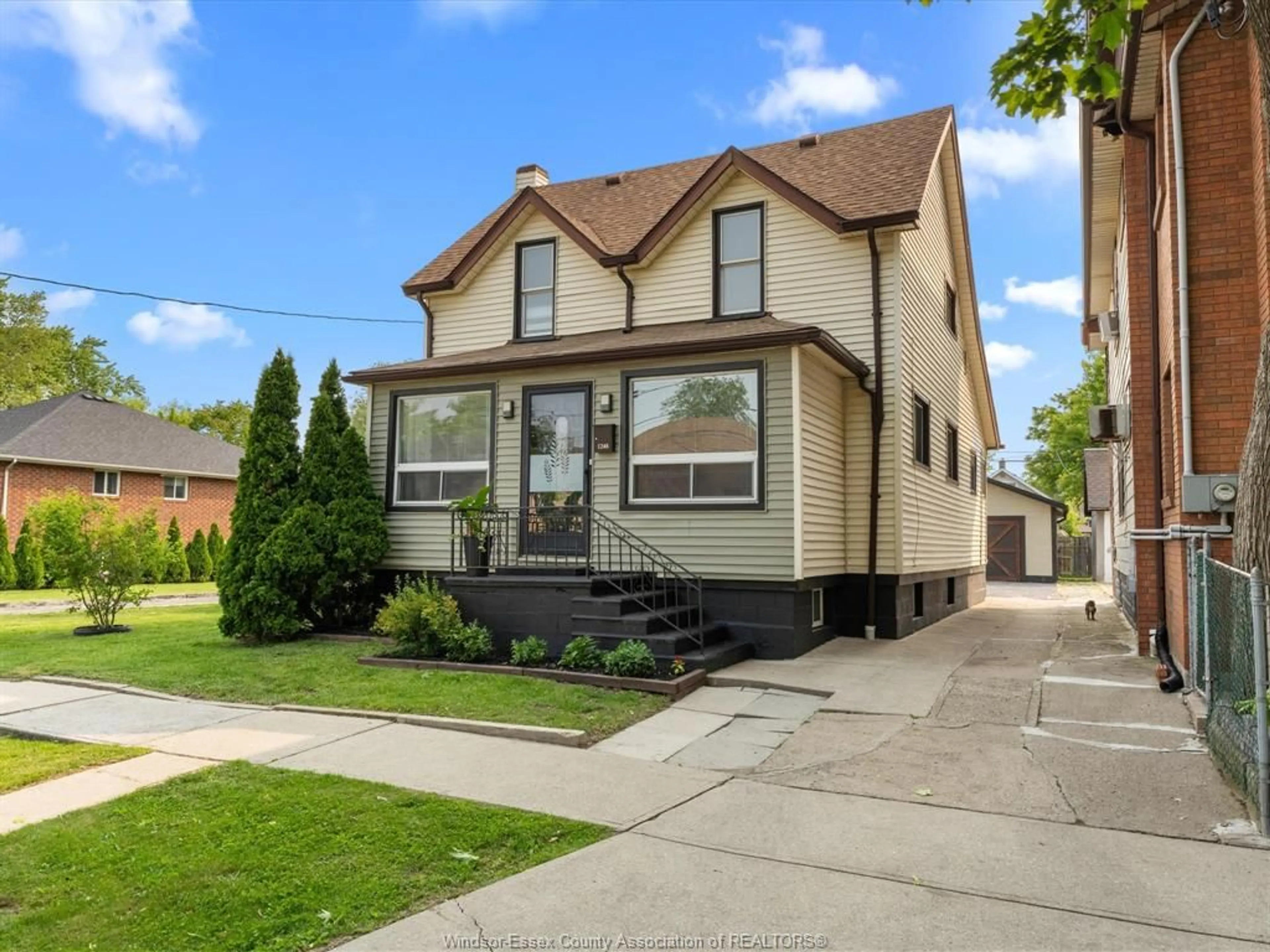 Home with vinyl exterior material, street for 1248 HIGH St, Windsor Ontario N8Y 4B2