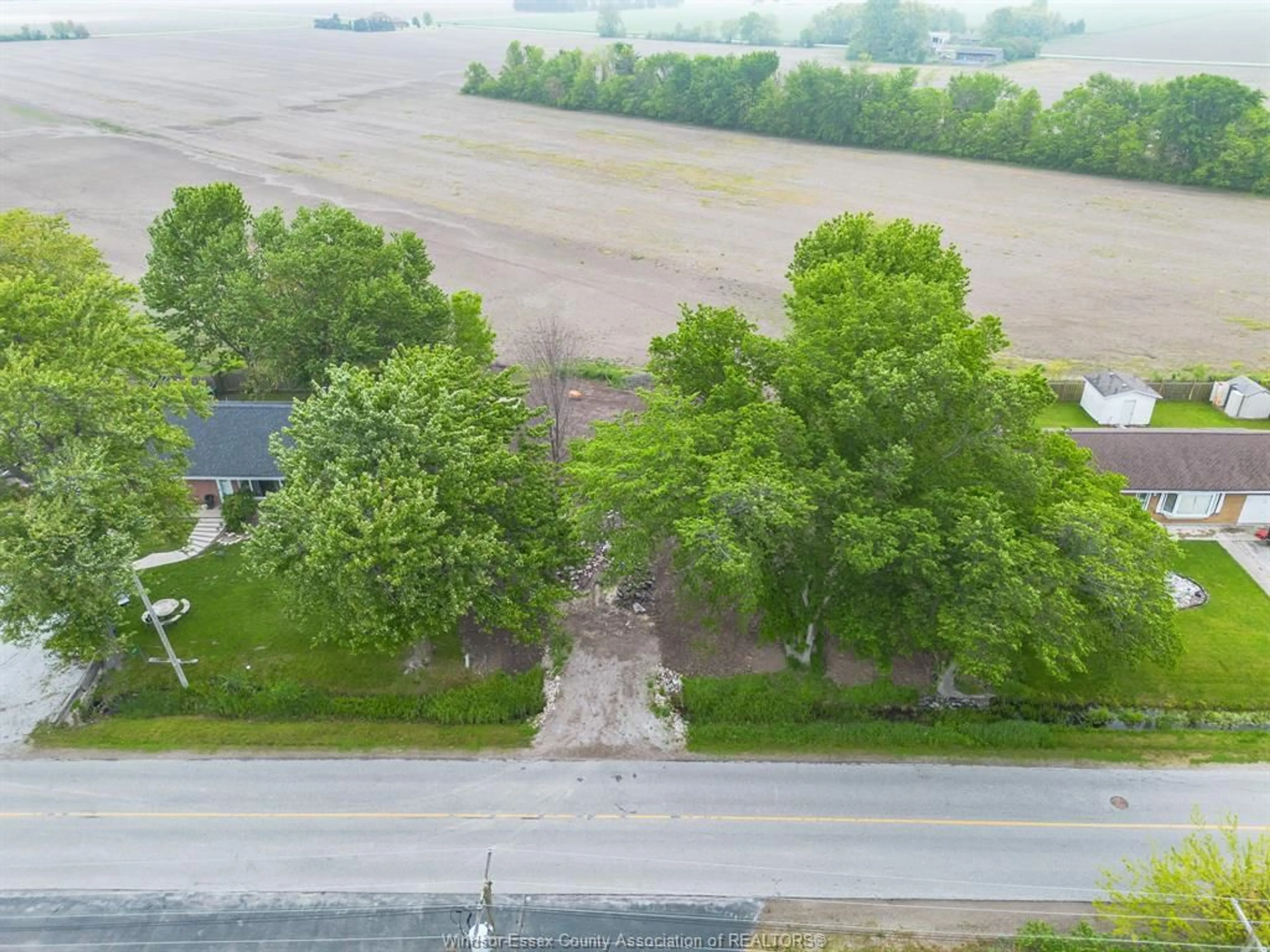 A pic from outside/outdoor area/front of a property/back of a property/a pic from drone, street for 775 POINT PELEE Dr, Leamington Ontario N8H 3V4