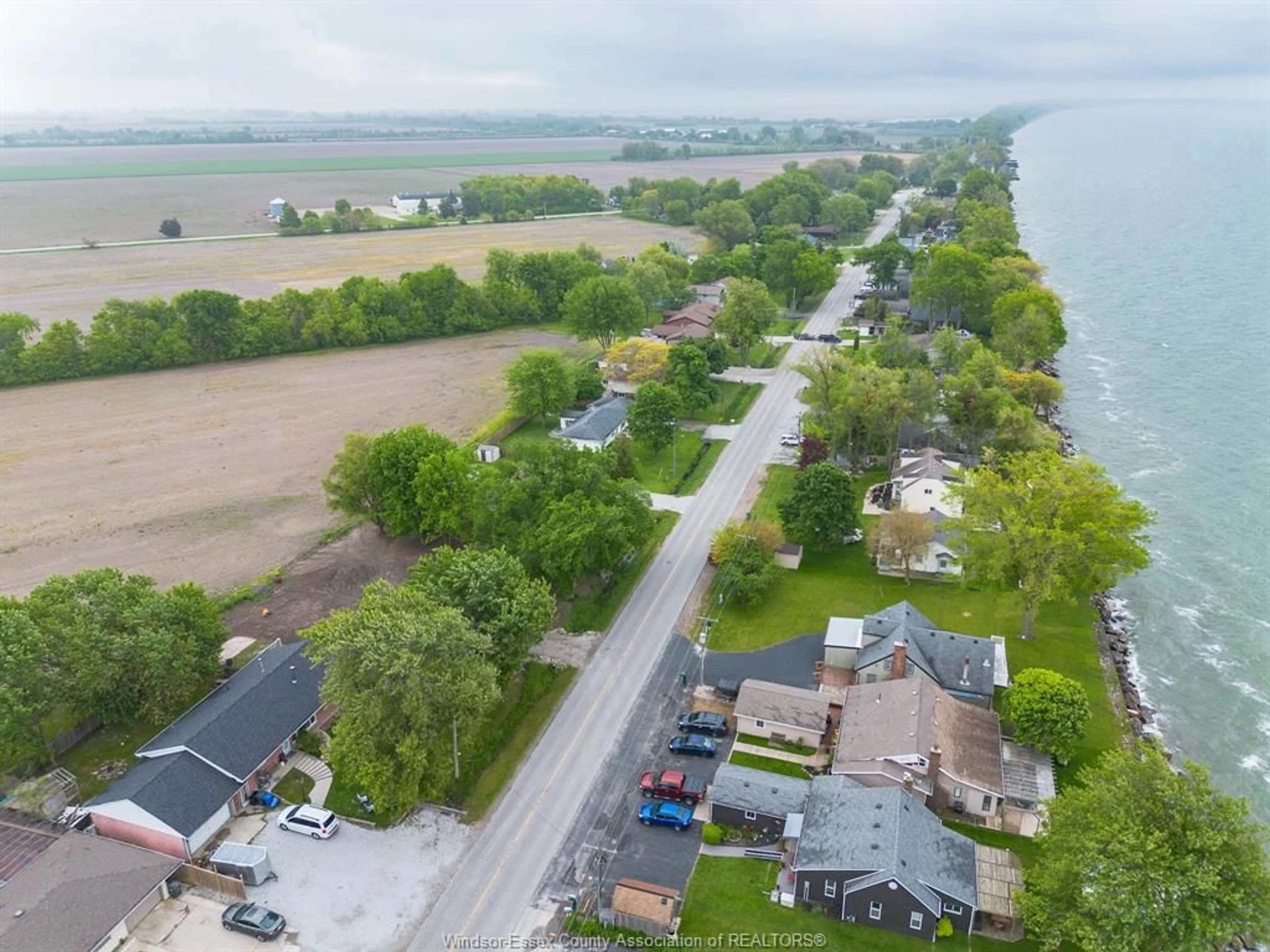 A pic from outside/outdoor area/front of a property/back of a property/a pic from drone, water/lake/river/ocean view for 775 POINT PELEE Dr, Leamington Ontario N8H 3V4