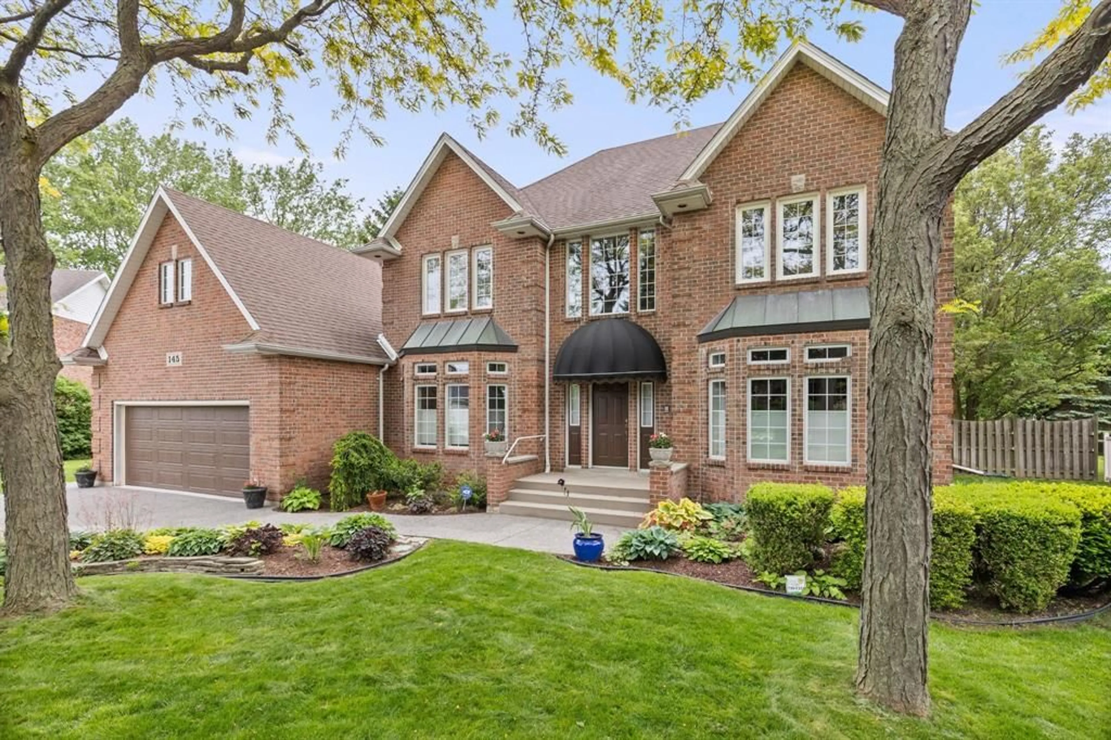 Home with brick exterior material, street for 145 MARTIN, Lakeshore Ontario N8L 0Z6