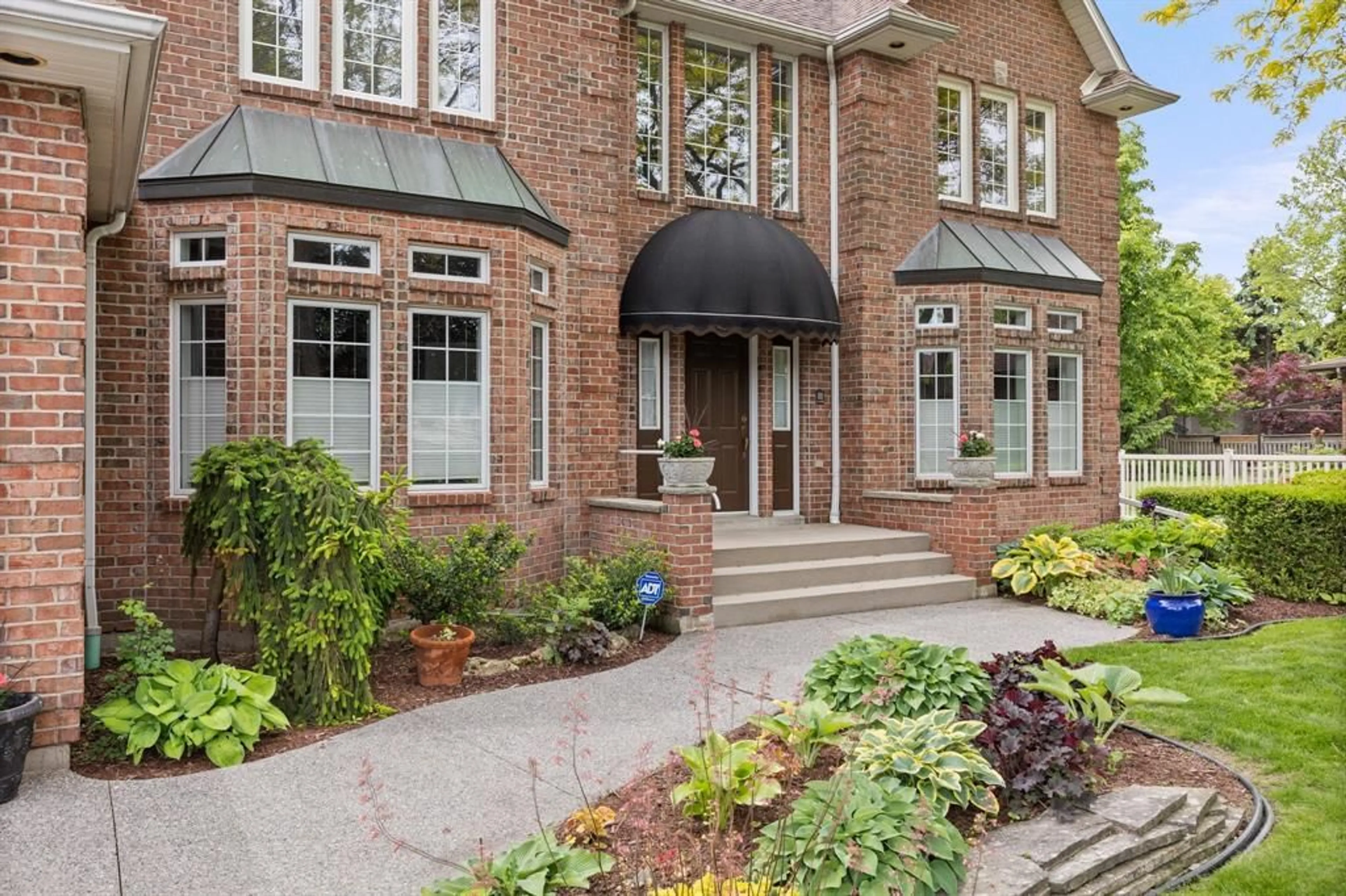 Home with brick exterior material, street for 145 MARTIN, Lakeshore Ontario N8L 0Z6
