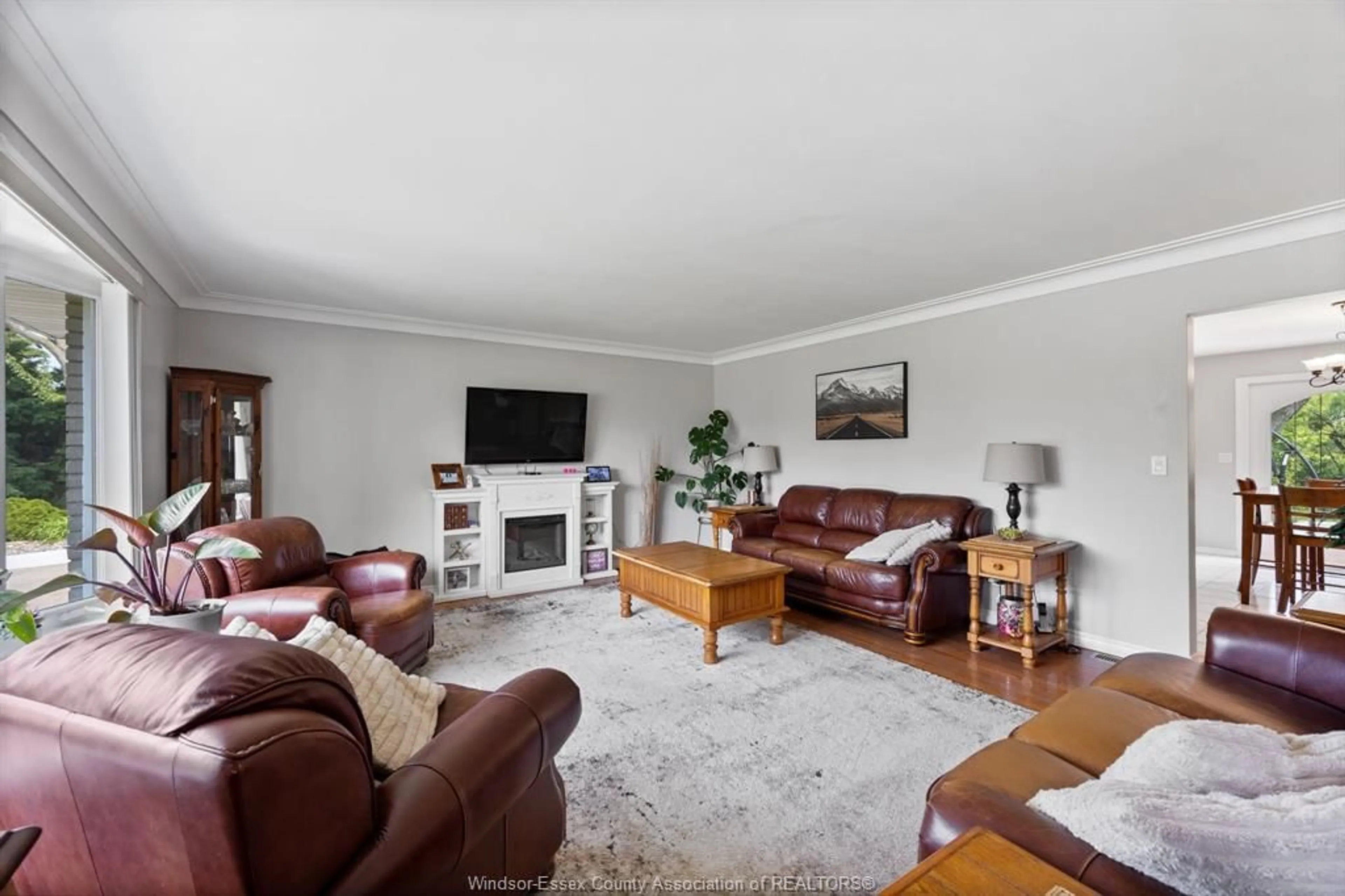 Living room with furniture, wood/laminate floor for 1226 AIMEE St, Lakeshore Ontario N0R 1S0