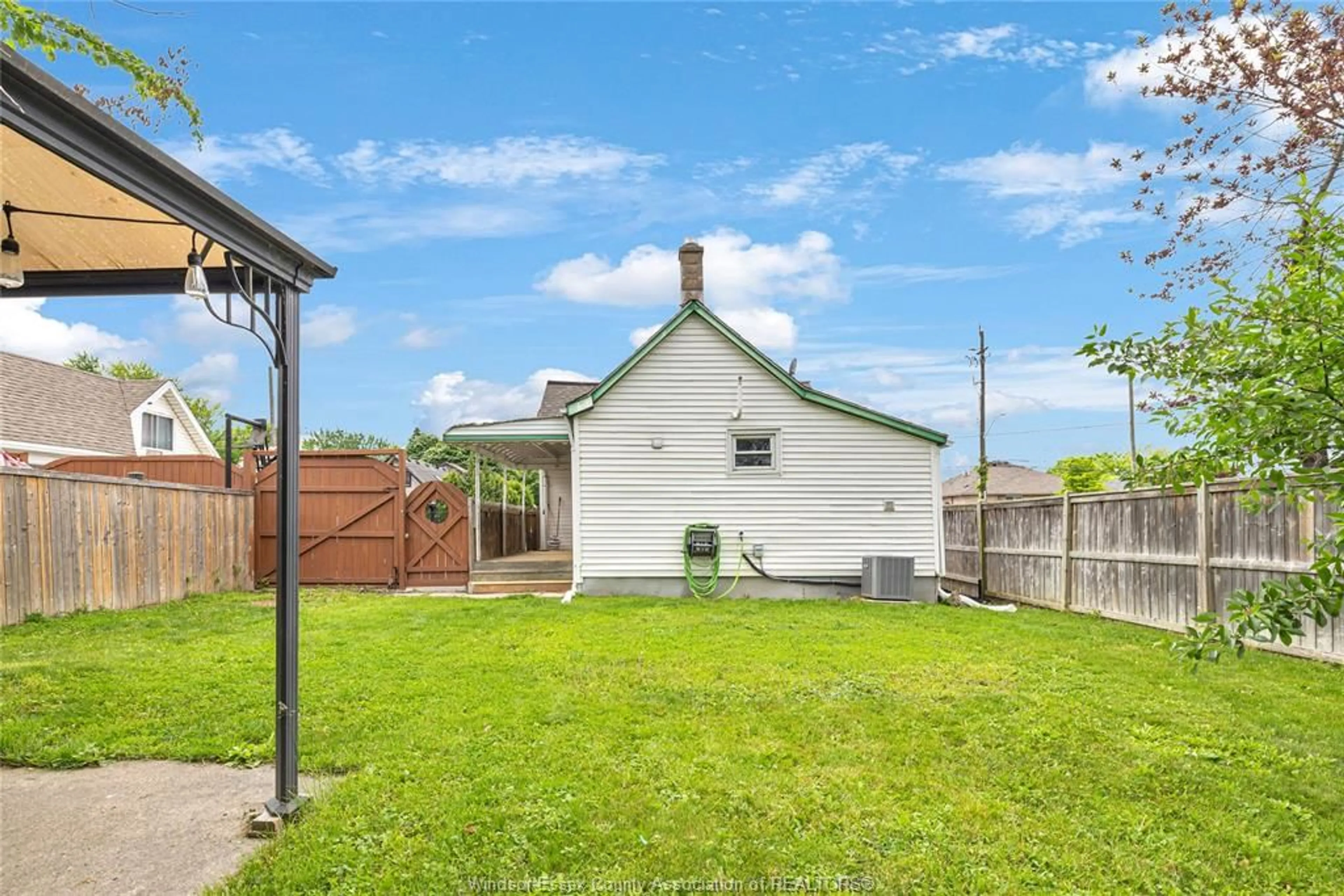 A pic from outside/outdoor area/front of a property/back of a property/a pic from drone, street for 2598 PILLETTE Rd, Windsor Ontario N8T 3R5