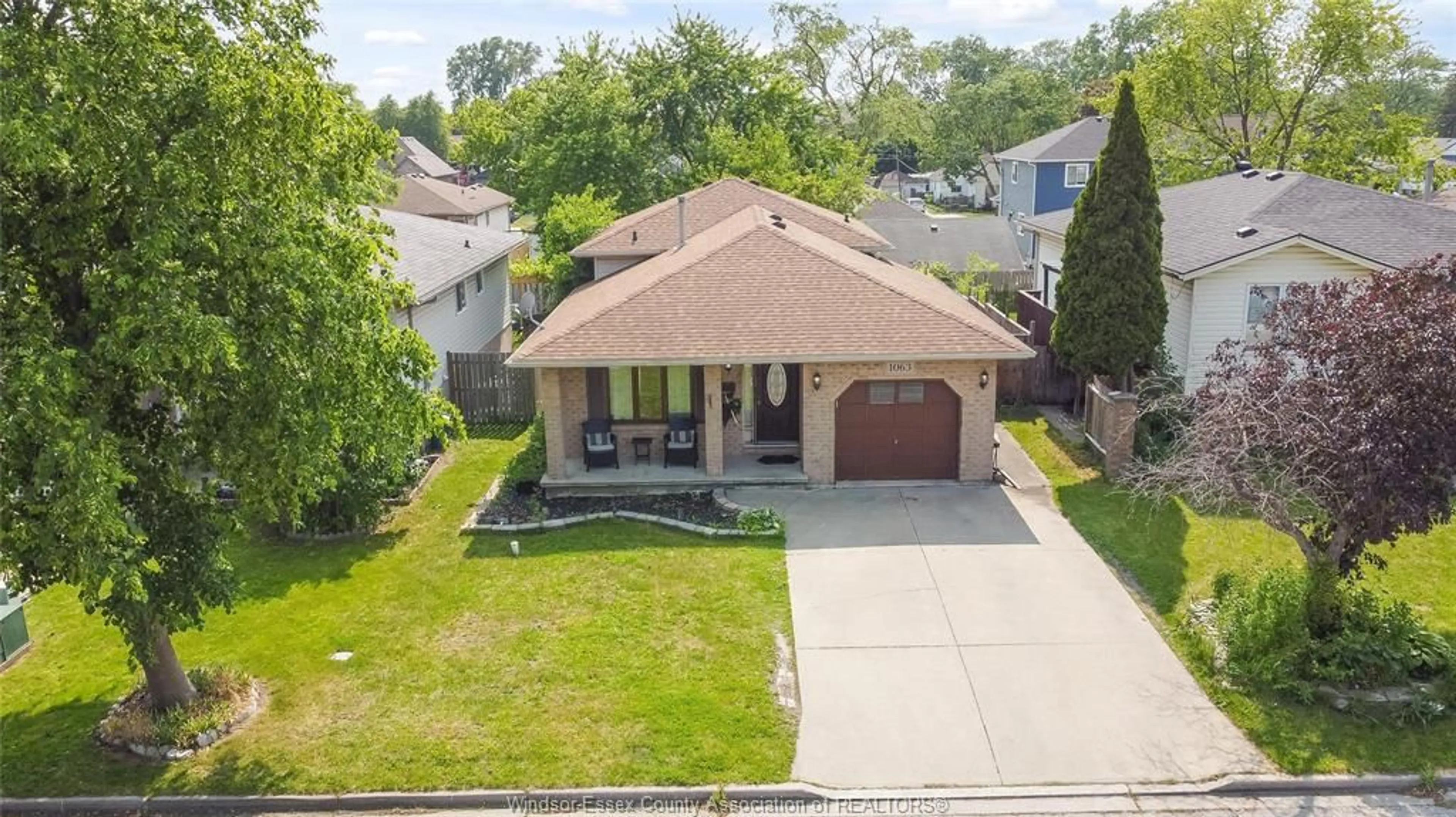 A pic from outside/outdoor area/front of a property/back of a property/a pic from drone, street for 1063 BROOKVIEW, Windsor Ontario N8W 5H4