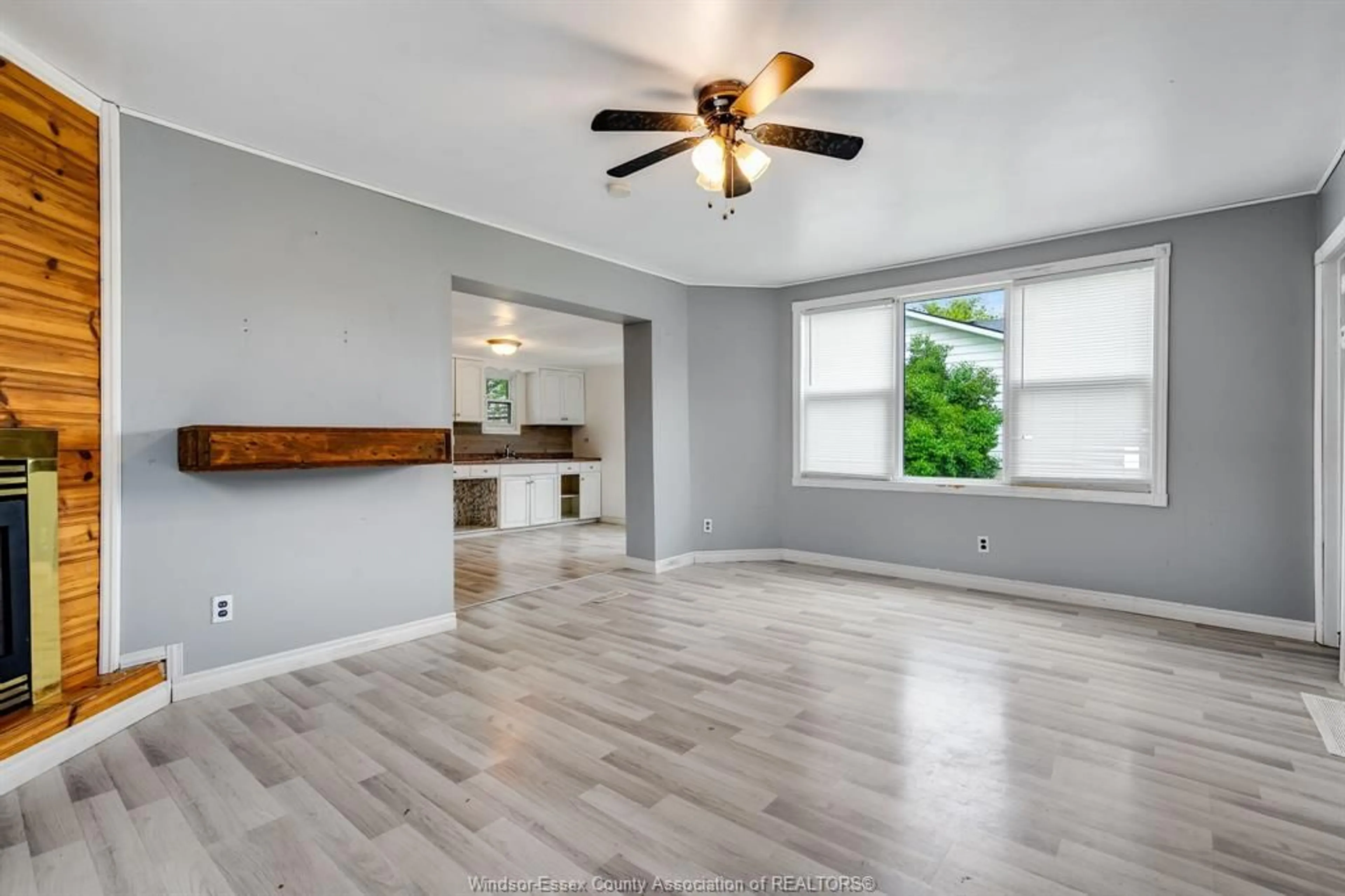 Living room with furniture, wood/laminate floor for 31 CHESTNUT St, Wheatley Ontario N0P 2P0