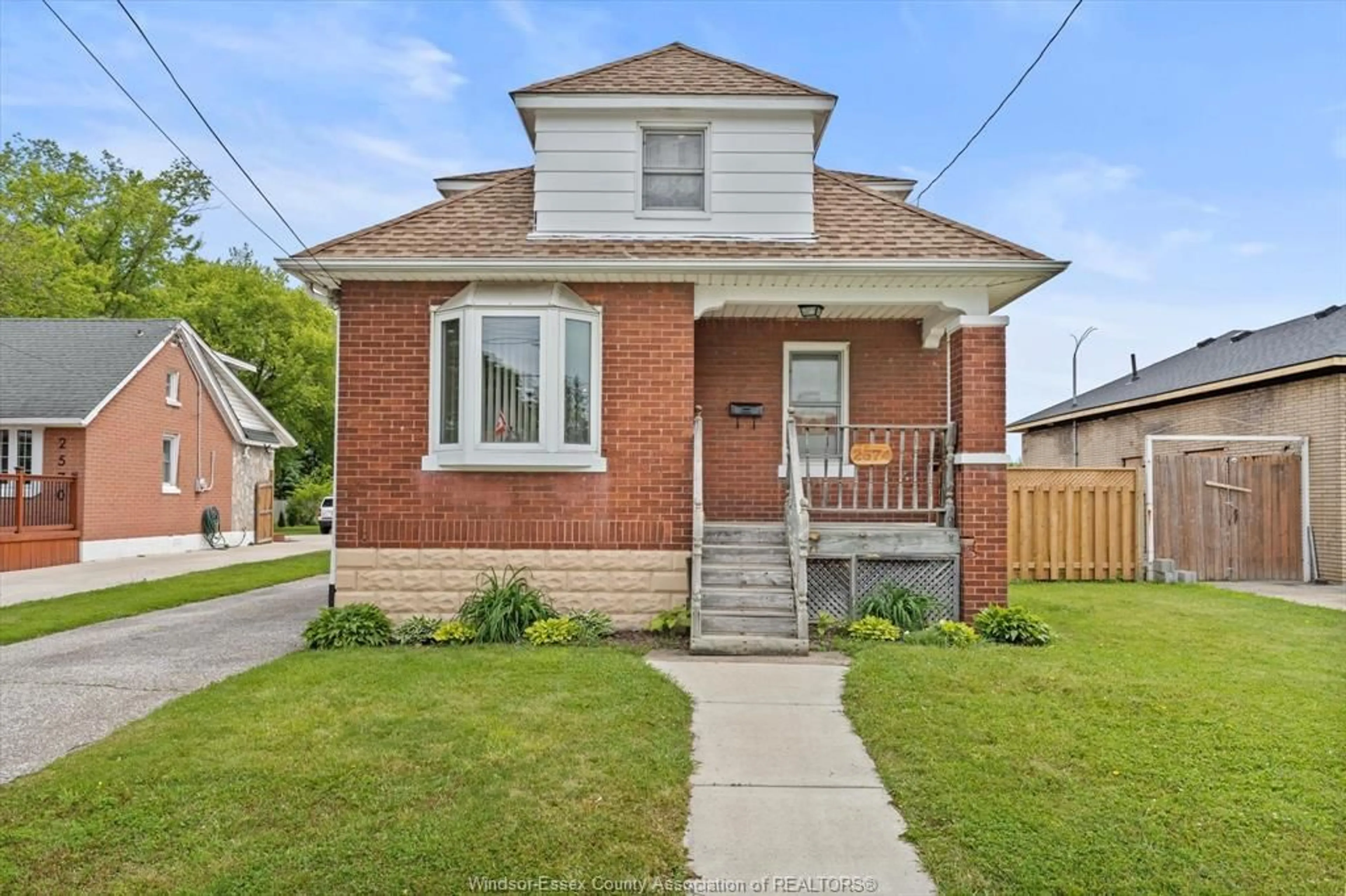 Home with brick exterior material, street for 2574 Jos St. Louis Ave, Windsor Ontario N8T 2M5
