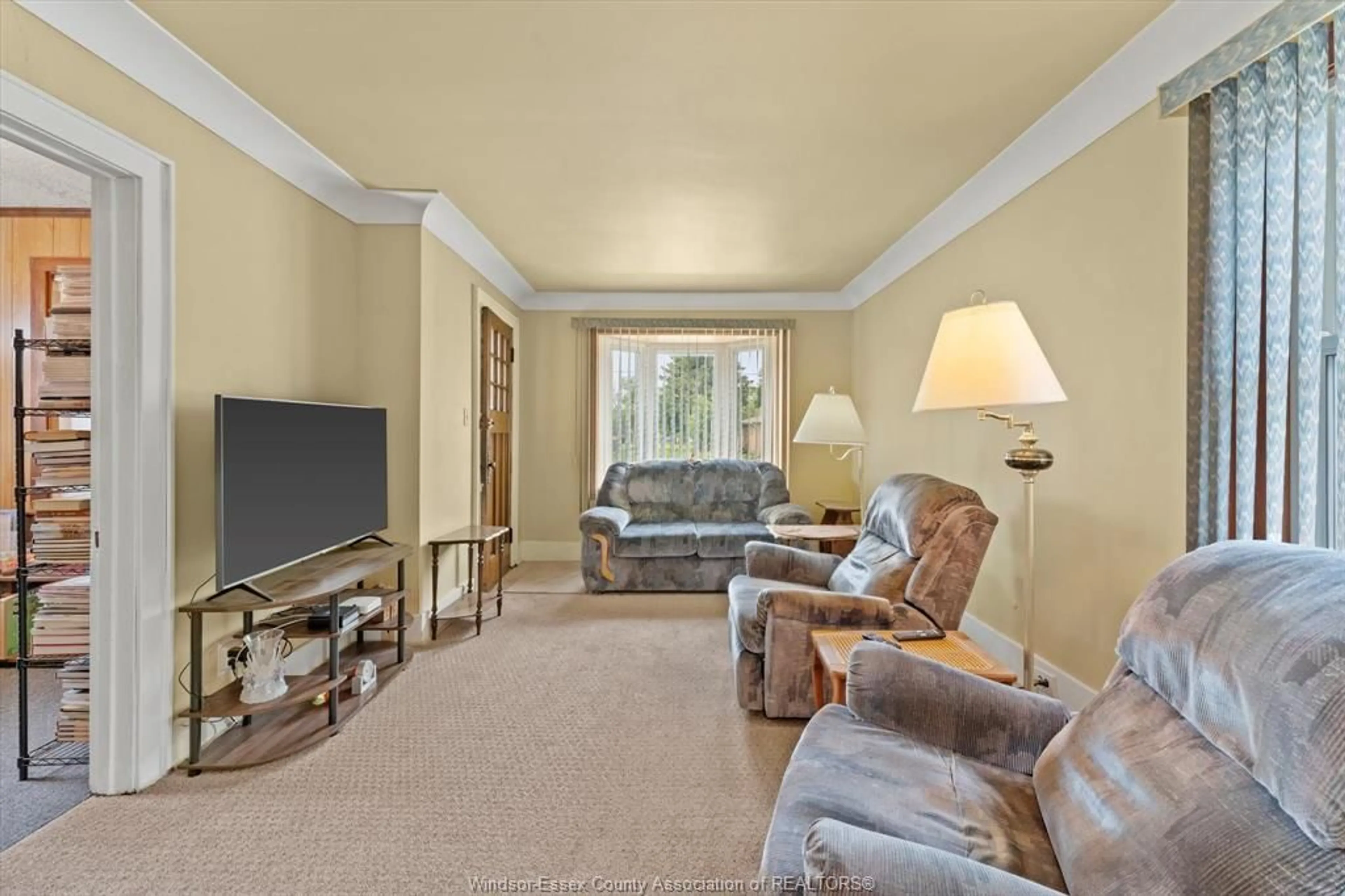 Living room with furniture, carpet floor for 2574 Jos St. Louis Ave, Windsor Ontario N8T 2M5