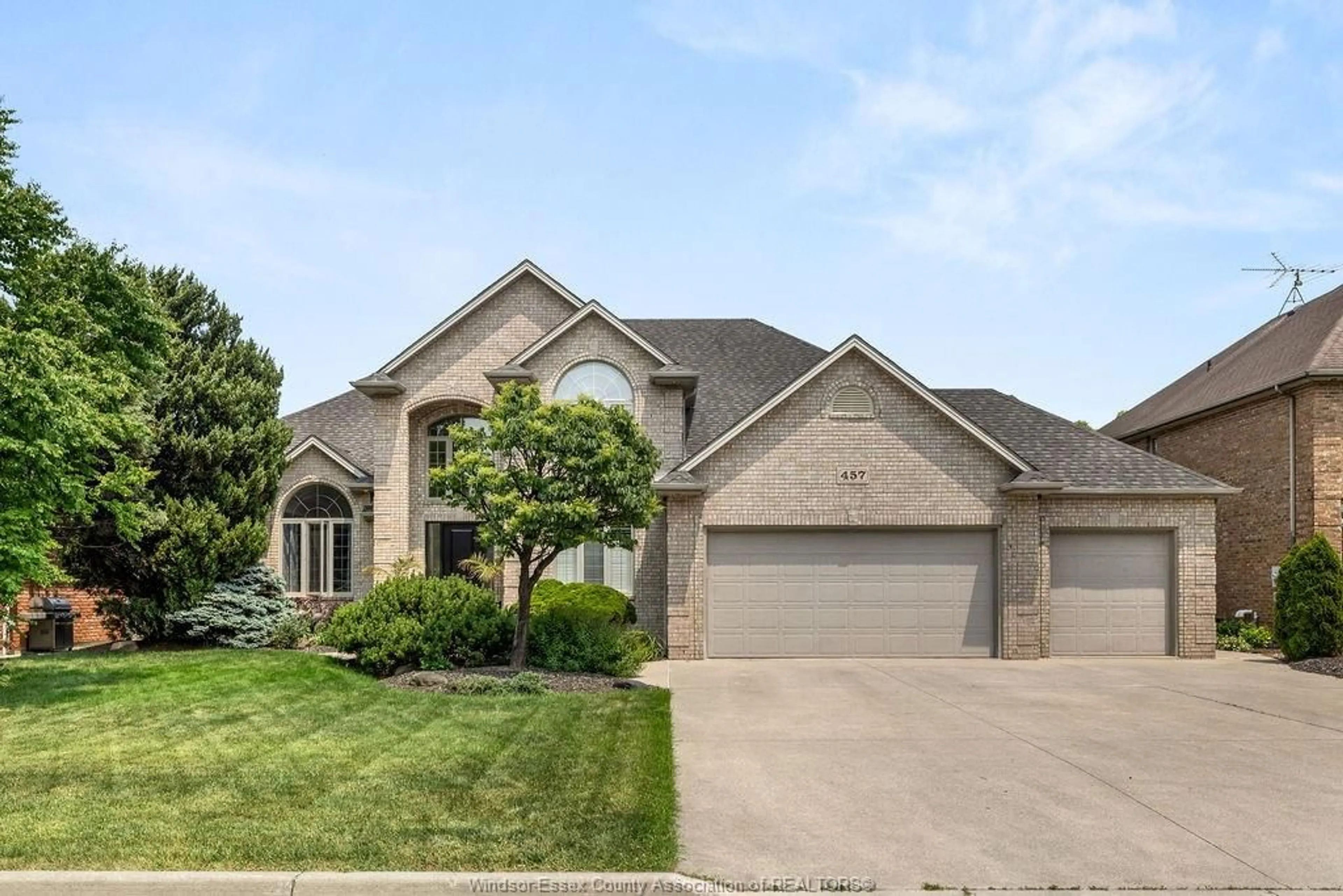 Home with brick exterior material, street for 457 ORCHARD PARK Dr, Lakeshore Ontario N8N 4Y2