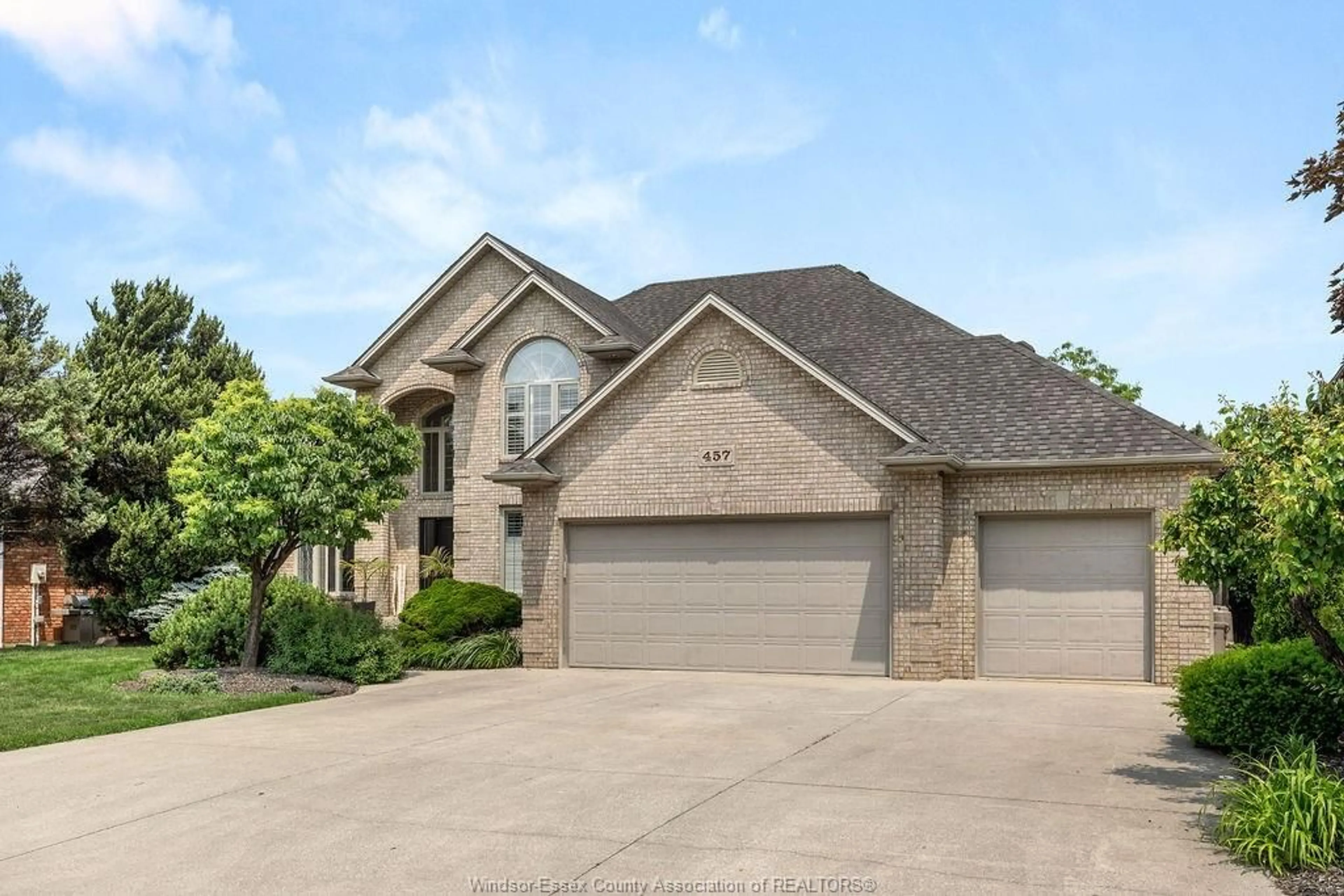 Home with brick exterior material, street for 457 ORCHARD PARK Dr, Lakeshore Ontario N8N 4Y2