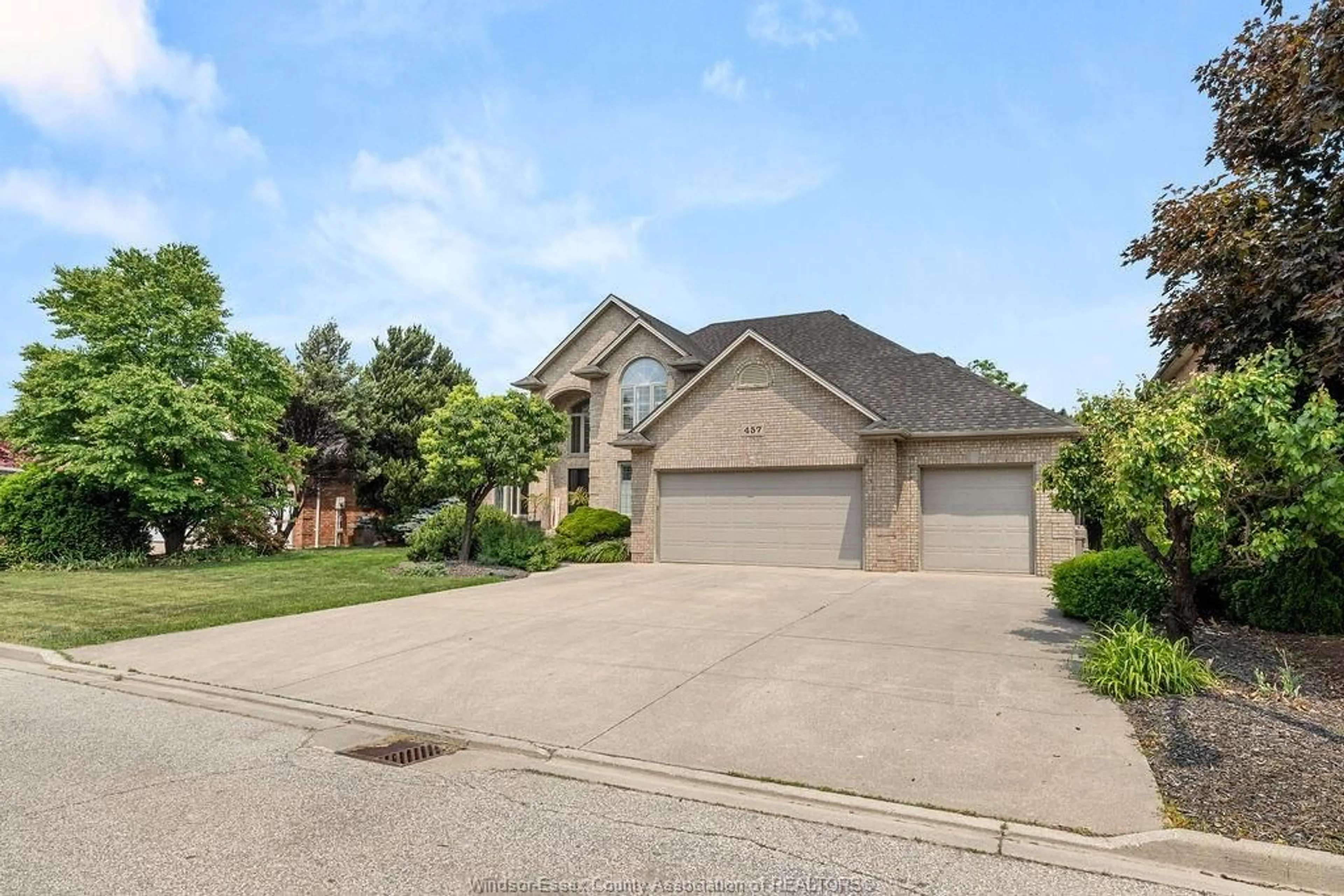 Home with brick exterior material, street for 457 ORCHARD PARK Dr, Lakeshore Ontario N8N 4Y2