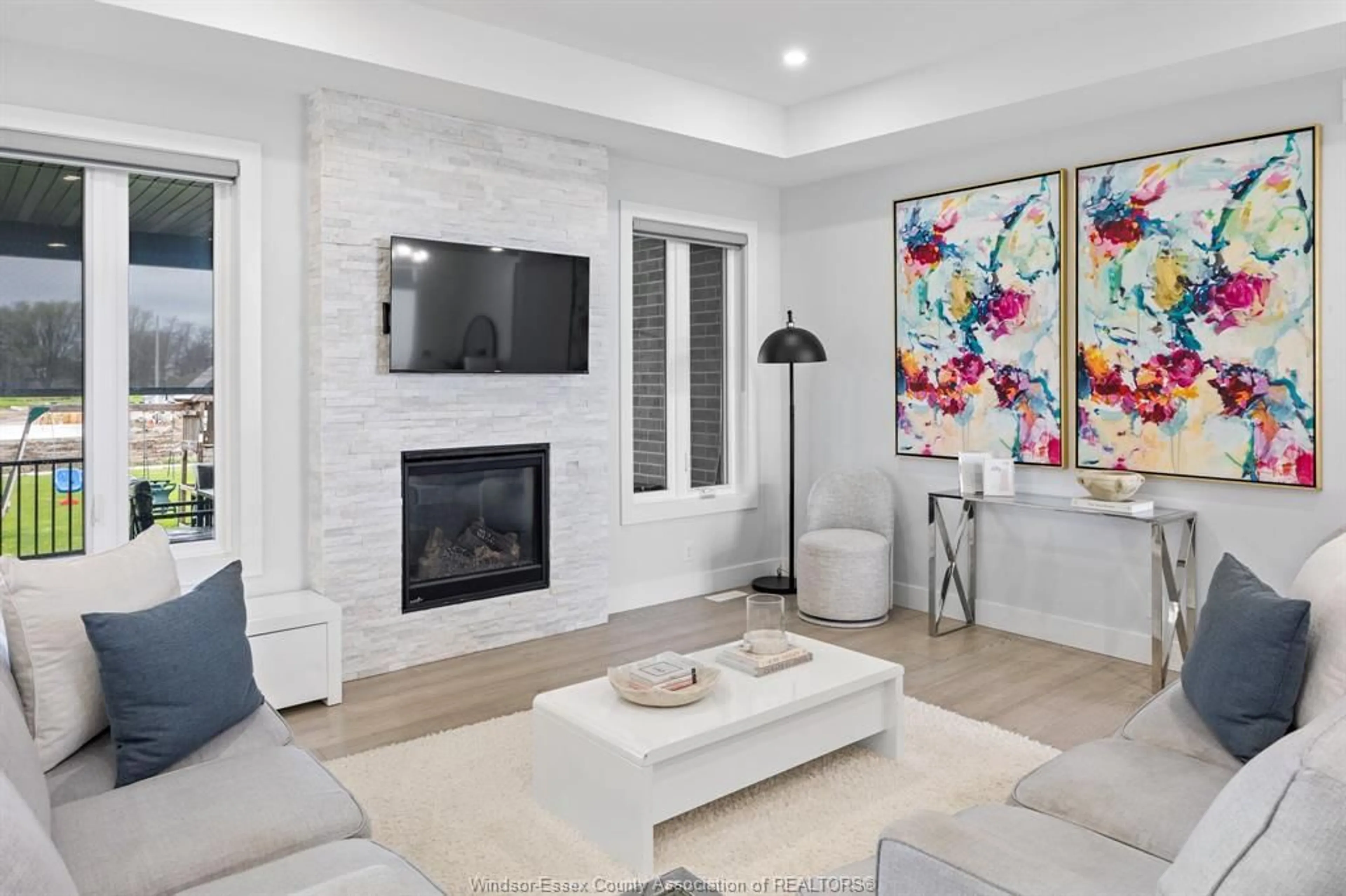 Living room with furniture, ceramic/tile floor for 77 OLIVE Dr, Leamington Ontario N8H 0E7