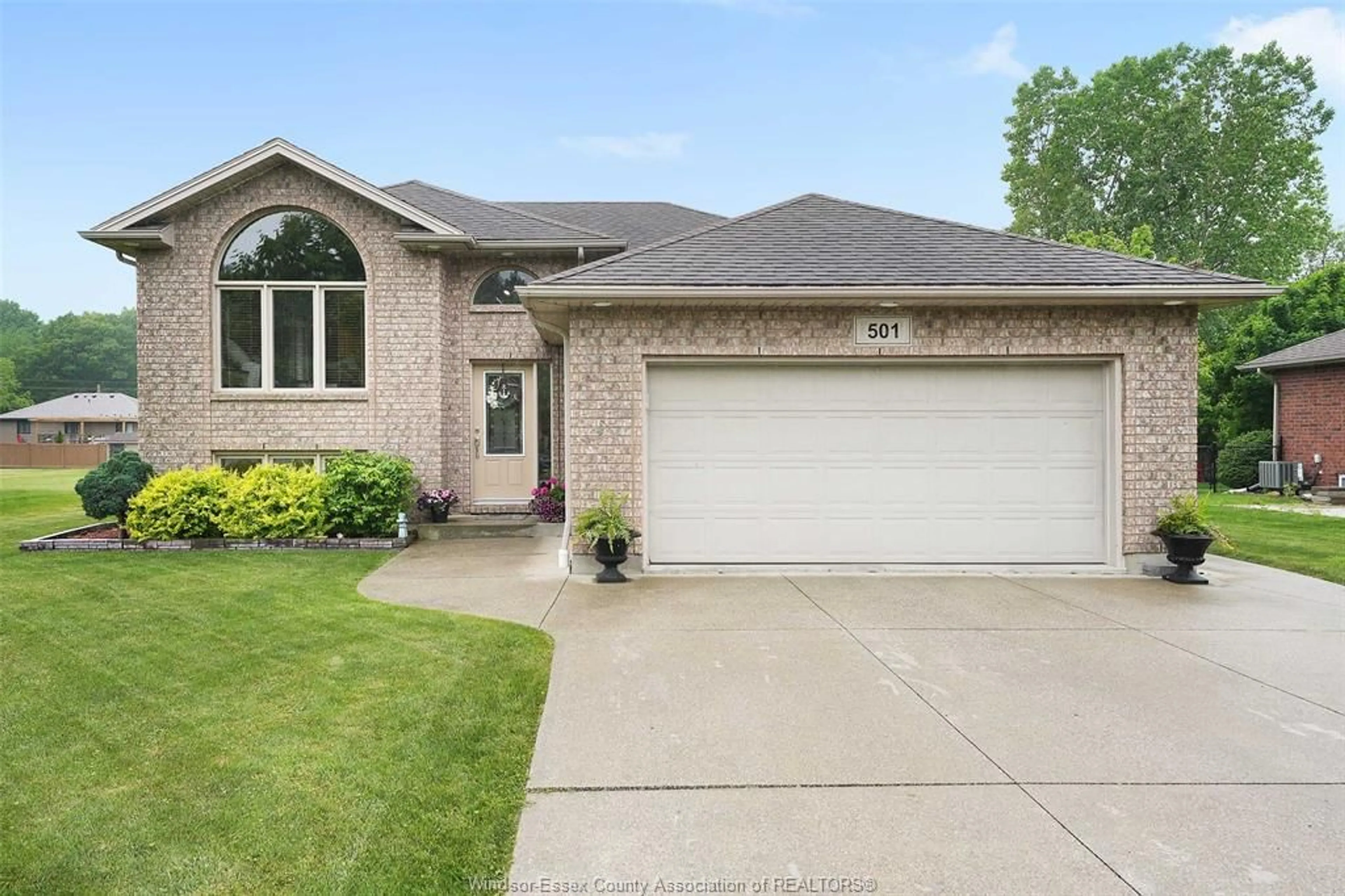 Home with brick exterior material, street for 501 Emily Lane, Wheatley Ontario N0P 2P0