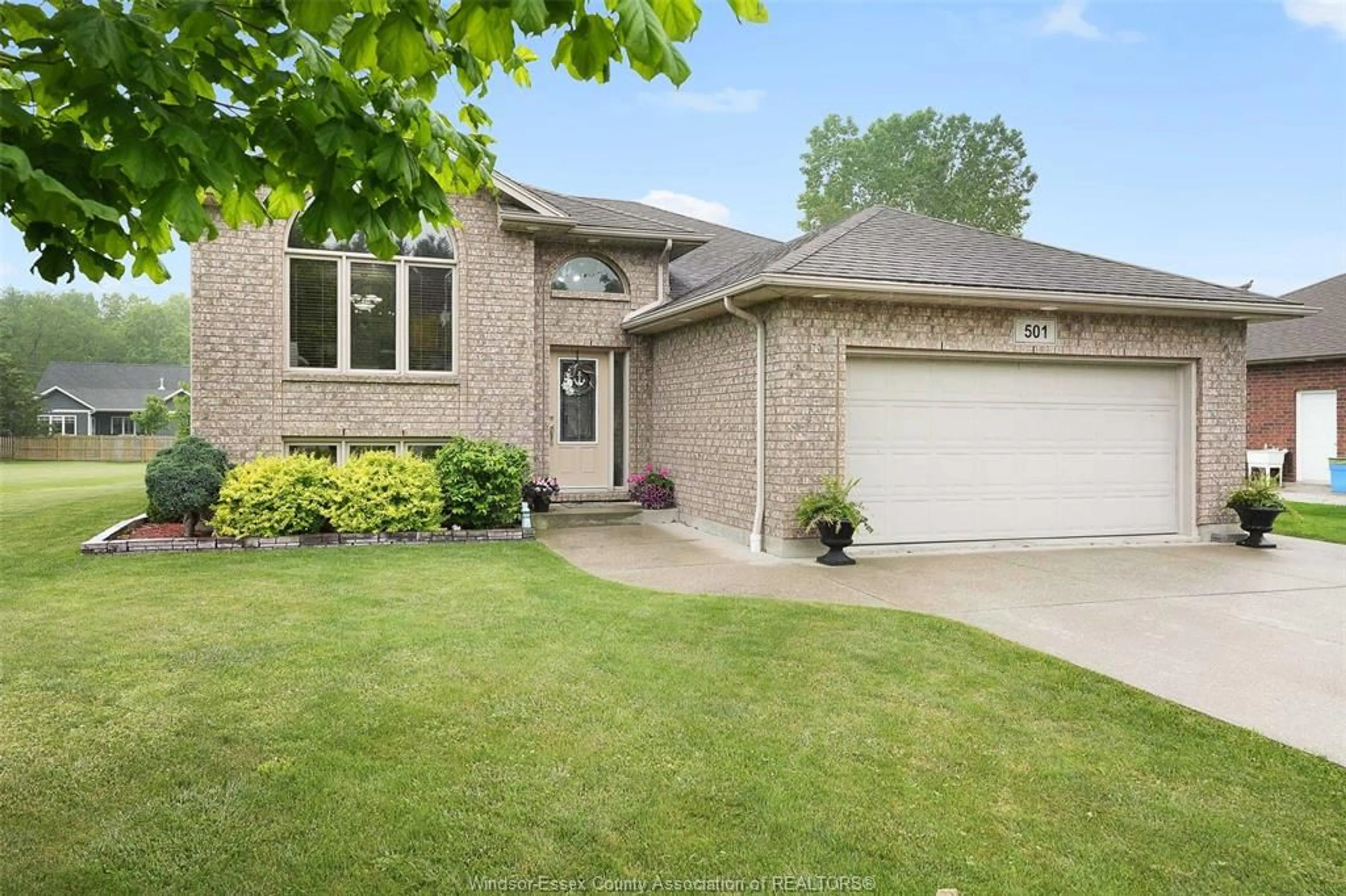 Home with brick exterior material, street for 501 Emily Lane, Wheatley Ontario N0P 2P0