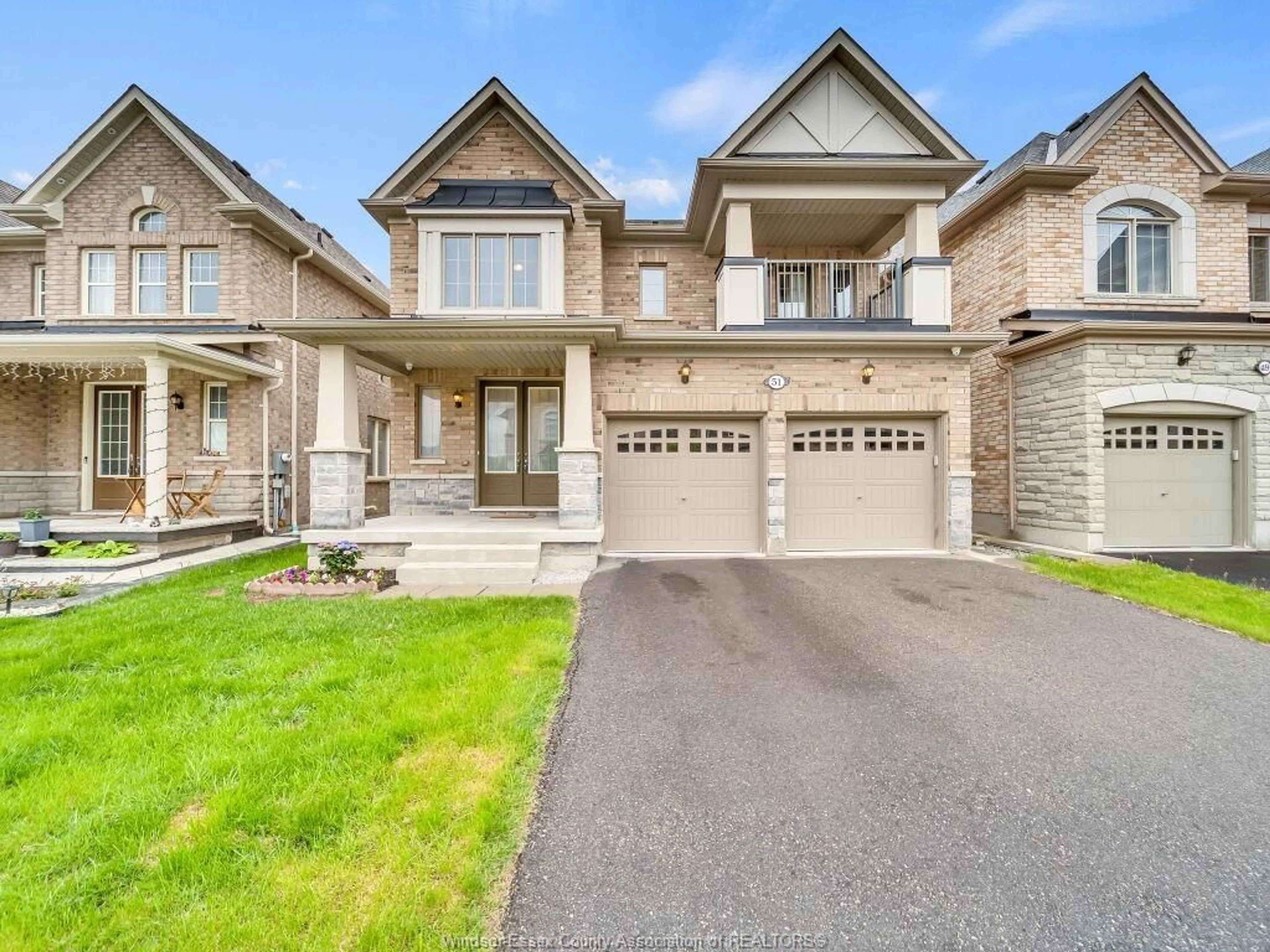 Home with brick exterior material, street for 51 MERRYBROOK Trail, Brampton Ontario L7A 4V8