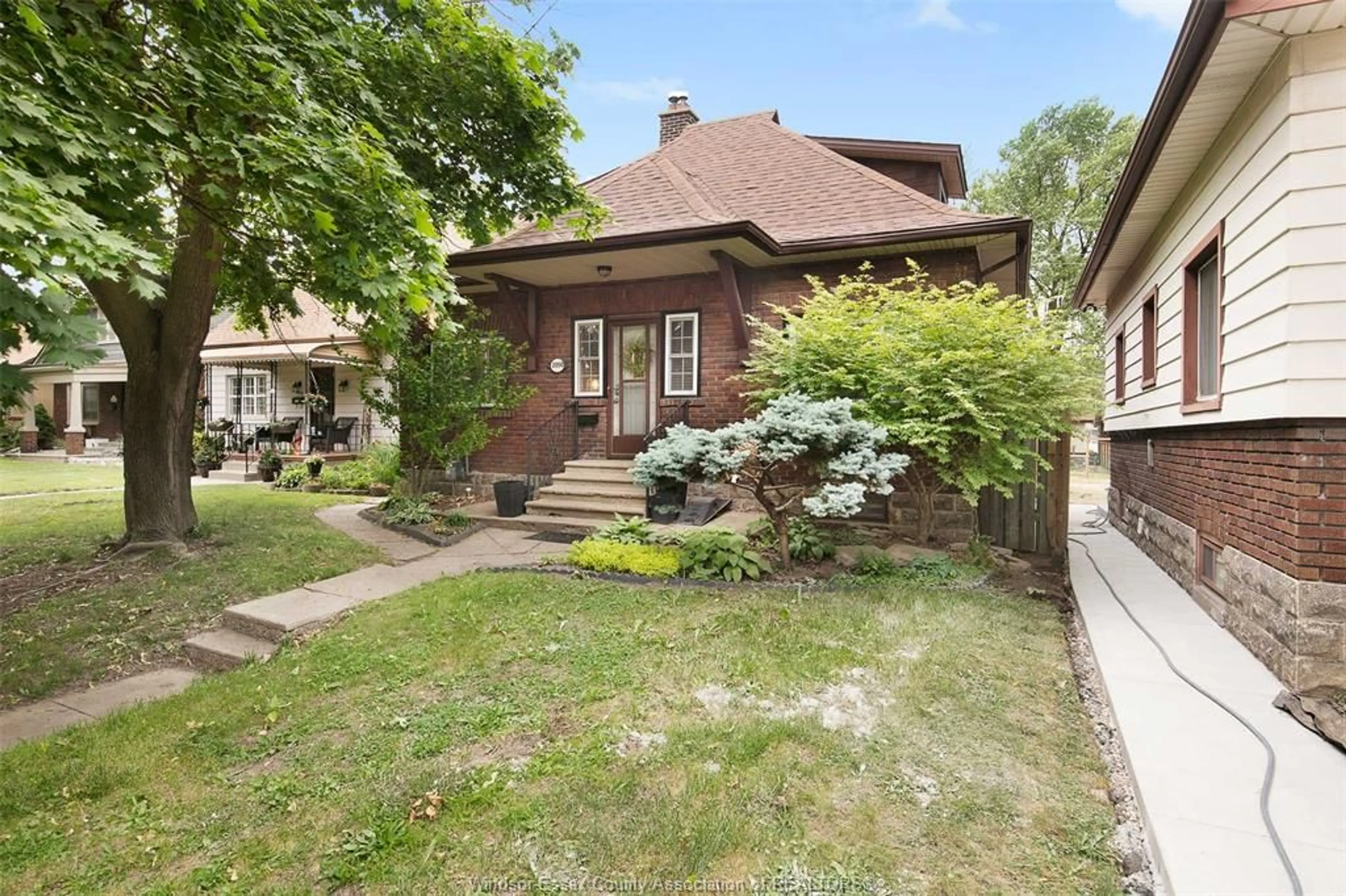 Home with brick exterior material, street for 2050 IROQUOIS, Windsor Ontario N8Y 1S2