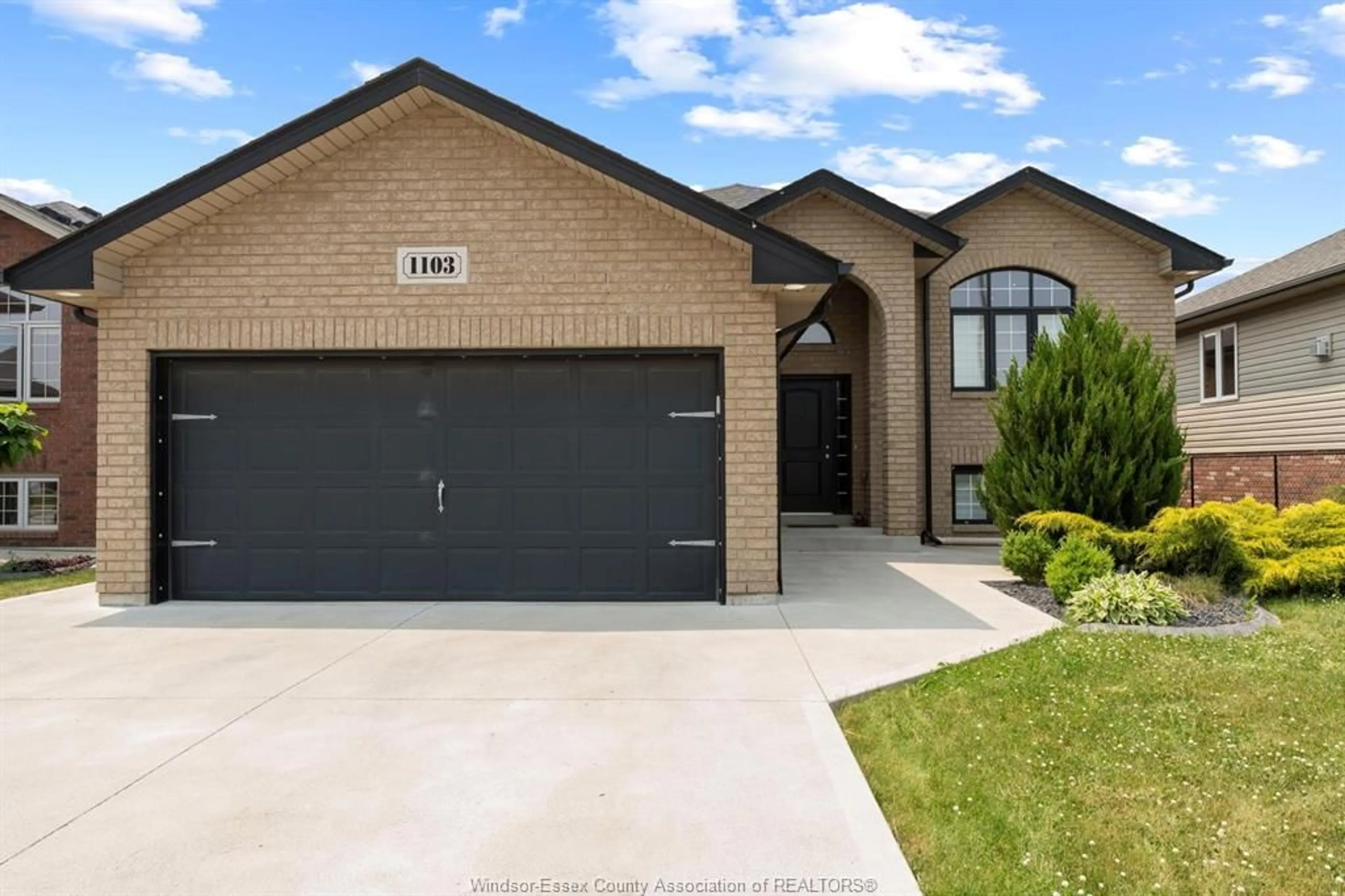 Home with brick exterior material, street for 1103 THUNDERBAY Ave, Windsor Ontario N8P 0C8