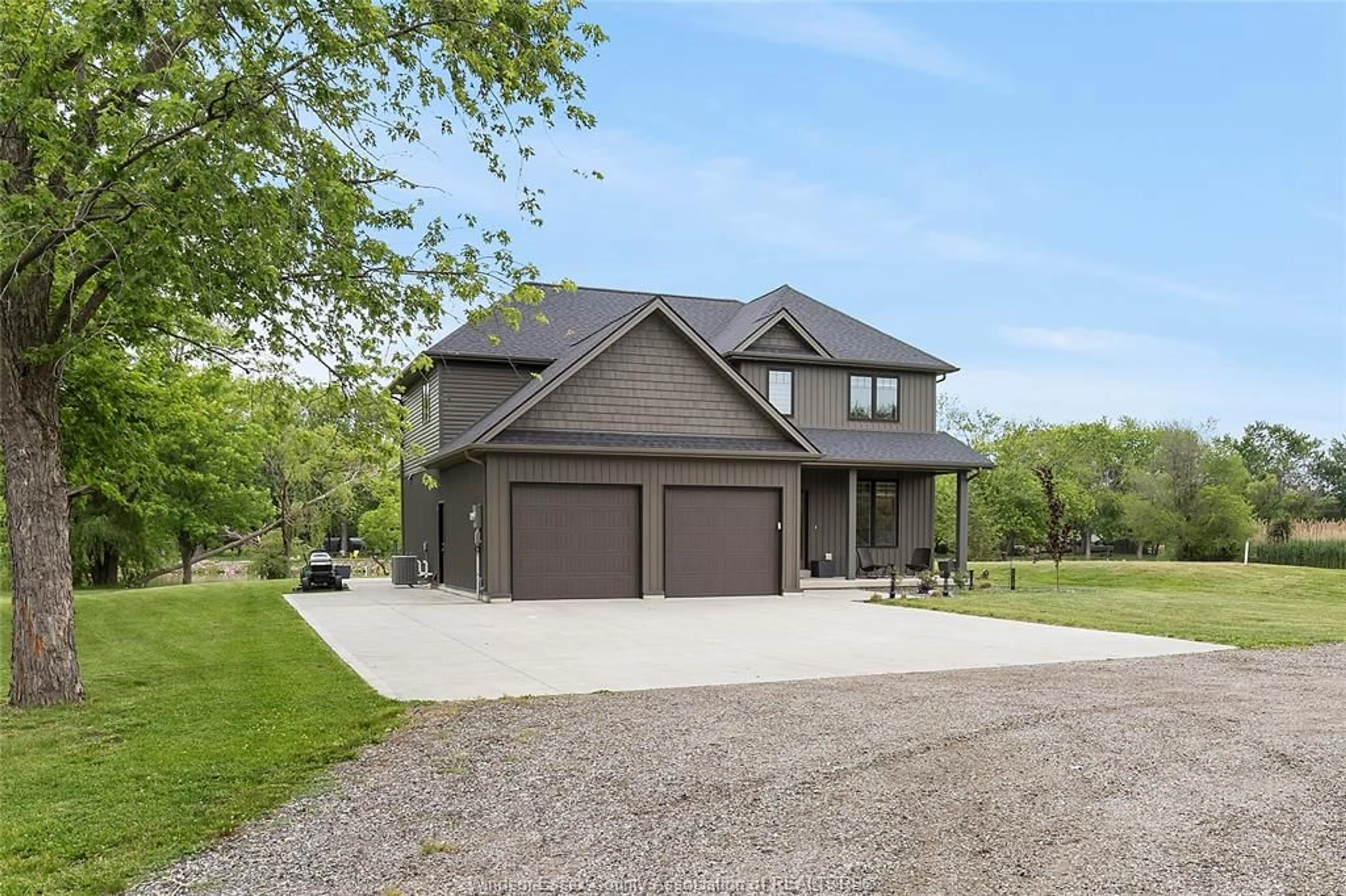 Home with vinyl exterior material, street for 432 COUNTY RD 31, Lakeshore Ontario N0R 1A0