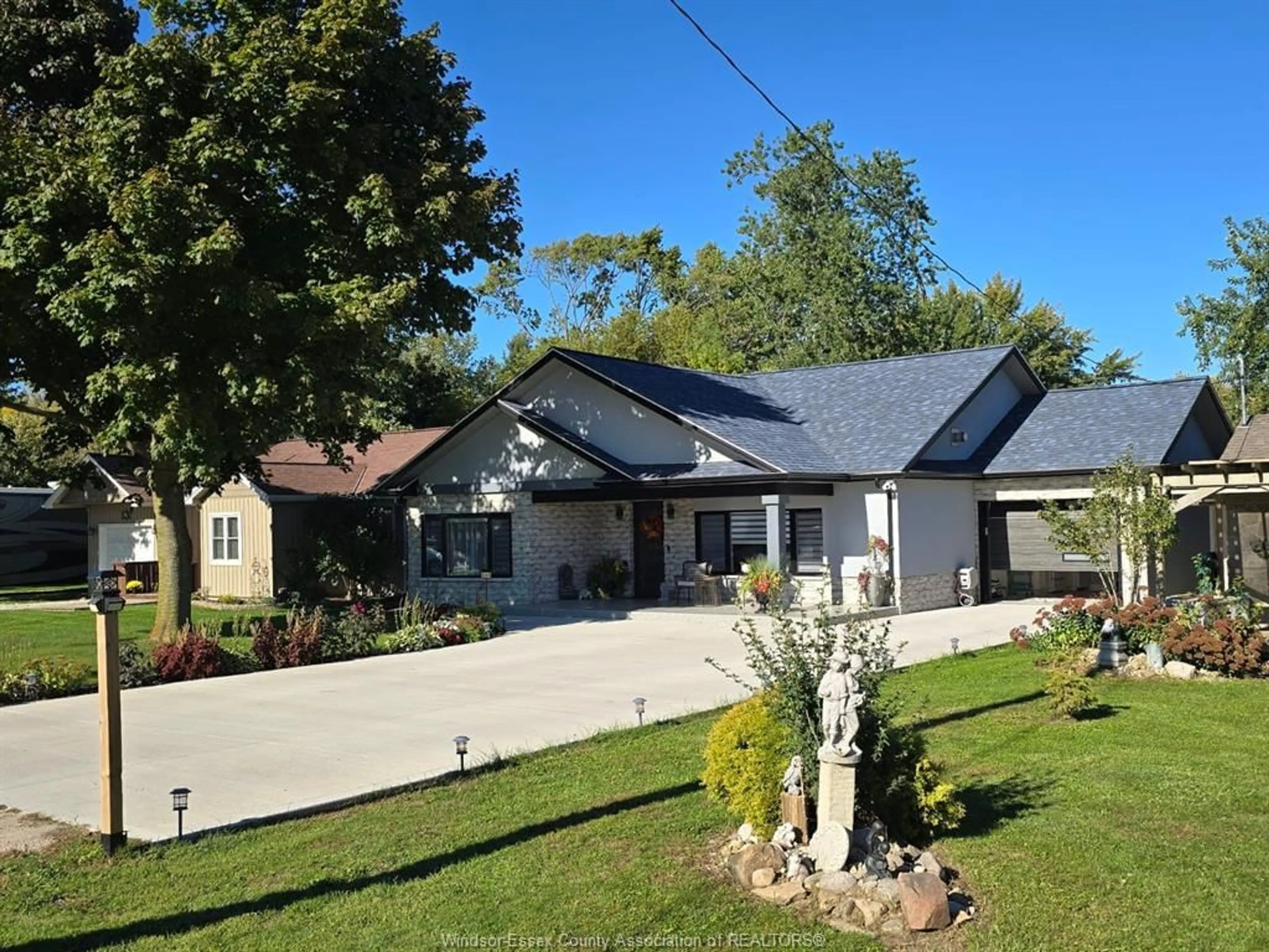 A pic from outside/outdoor area/front of a property/back of a property/a pic from drone, street for 643 POINT PELEE Dr, Leamington Ontario N8H 3V4