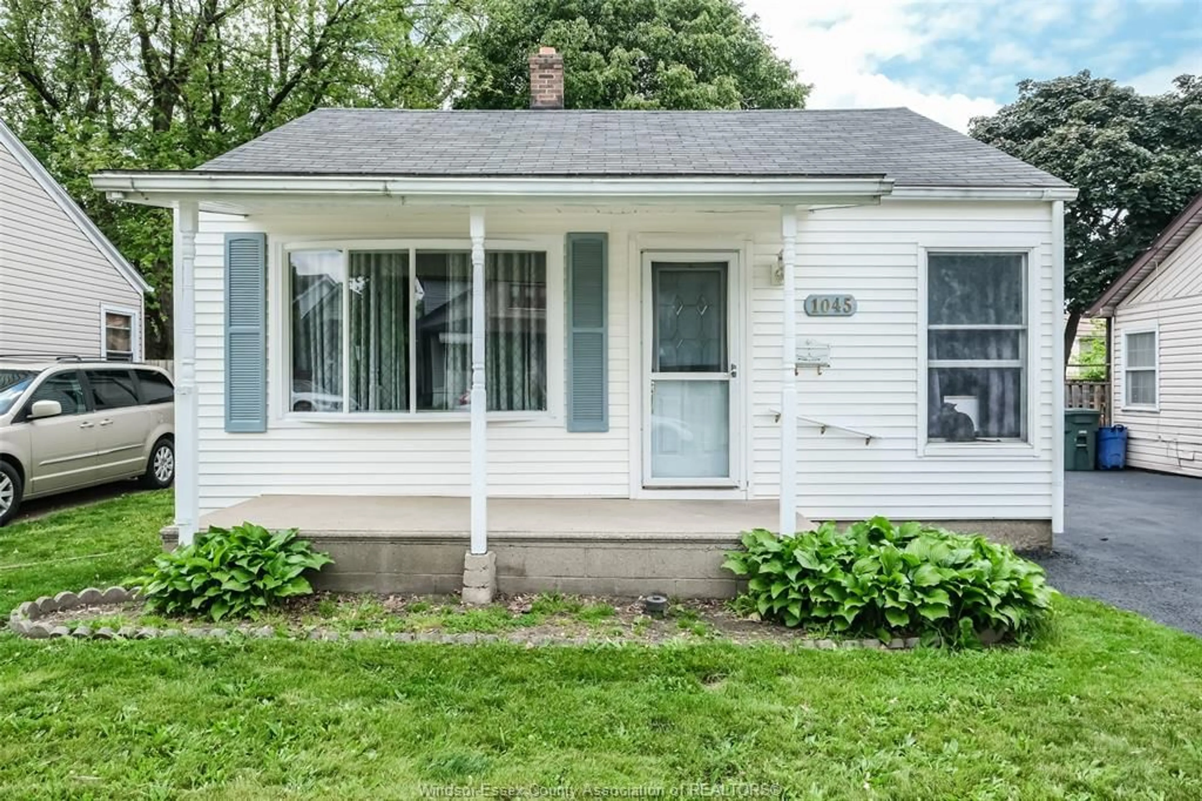 Home with vinyl exterior material, street for 1045 FELIX Ave, Windsor Ontario N9C 3L4