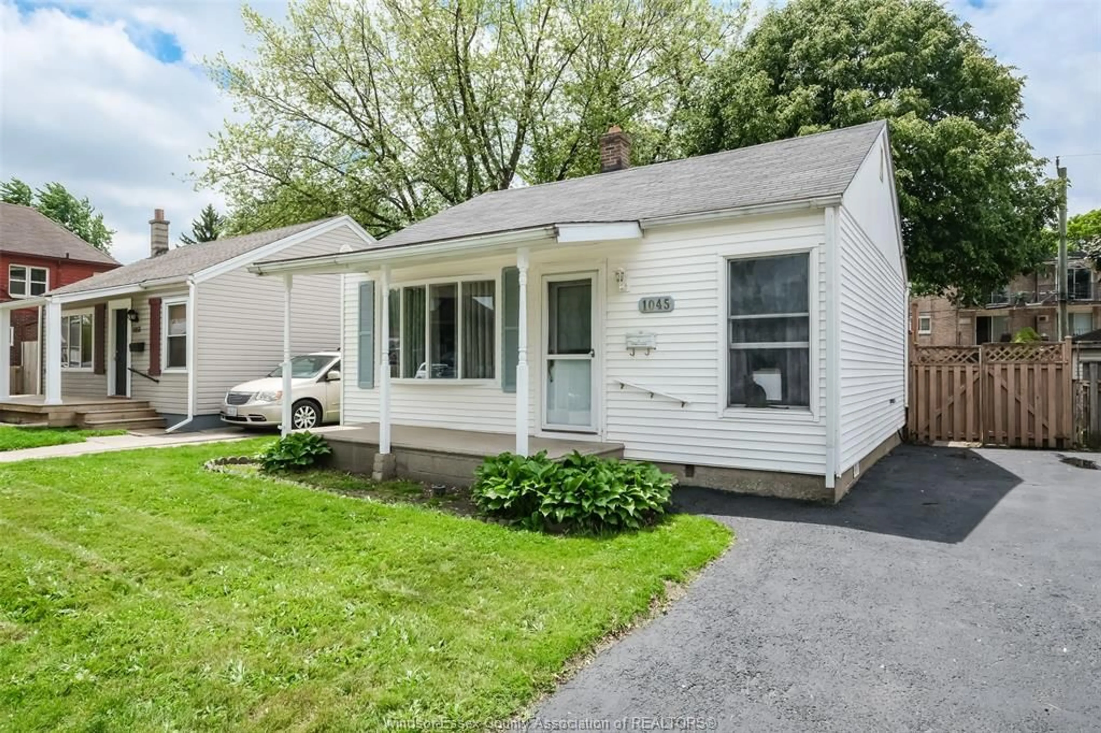 Home with vinyl exterior material, street for 1045 FELIX Ave, Windsor Ontario N9C 3L4
