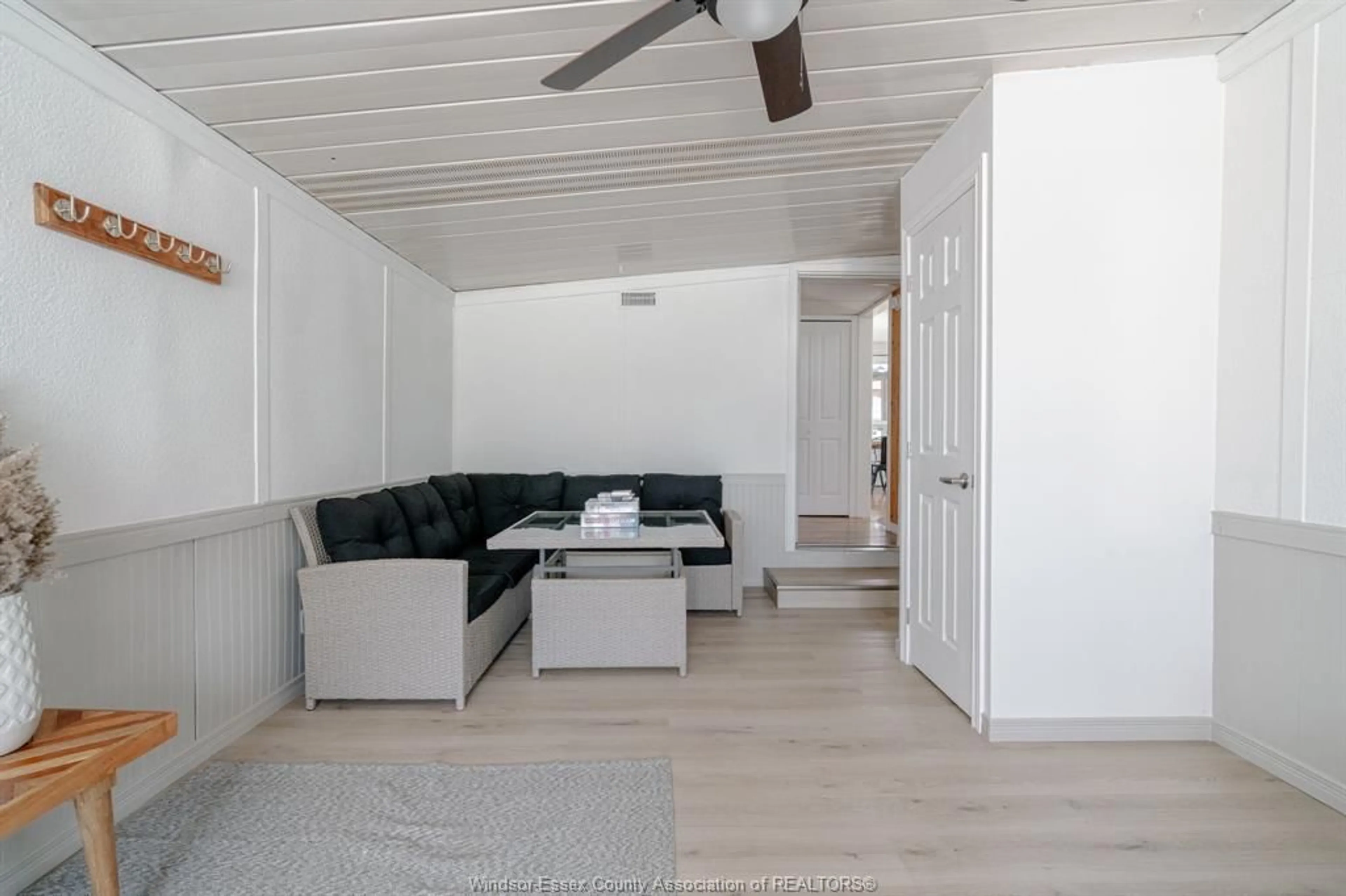 Living room with furniture, wood/laminate floor for 166 STIRLING St, Lakeshore Ontario N0R 1A0