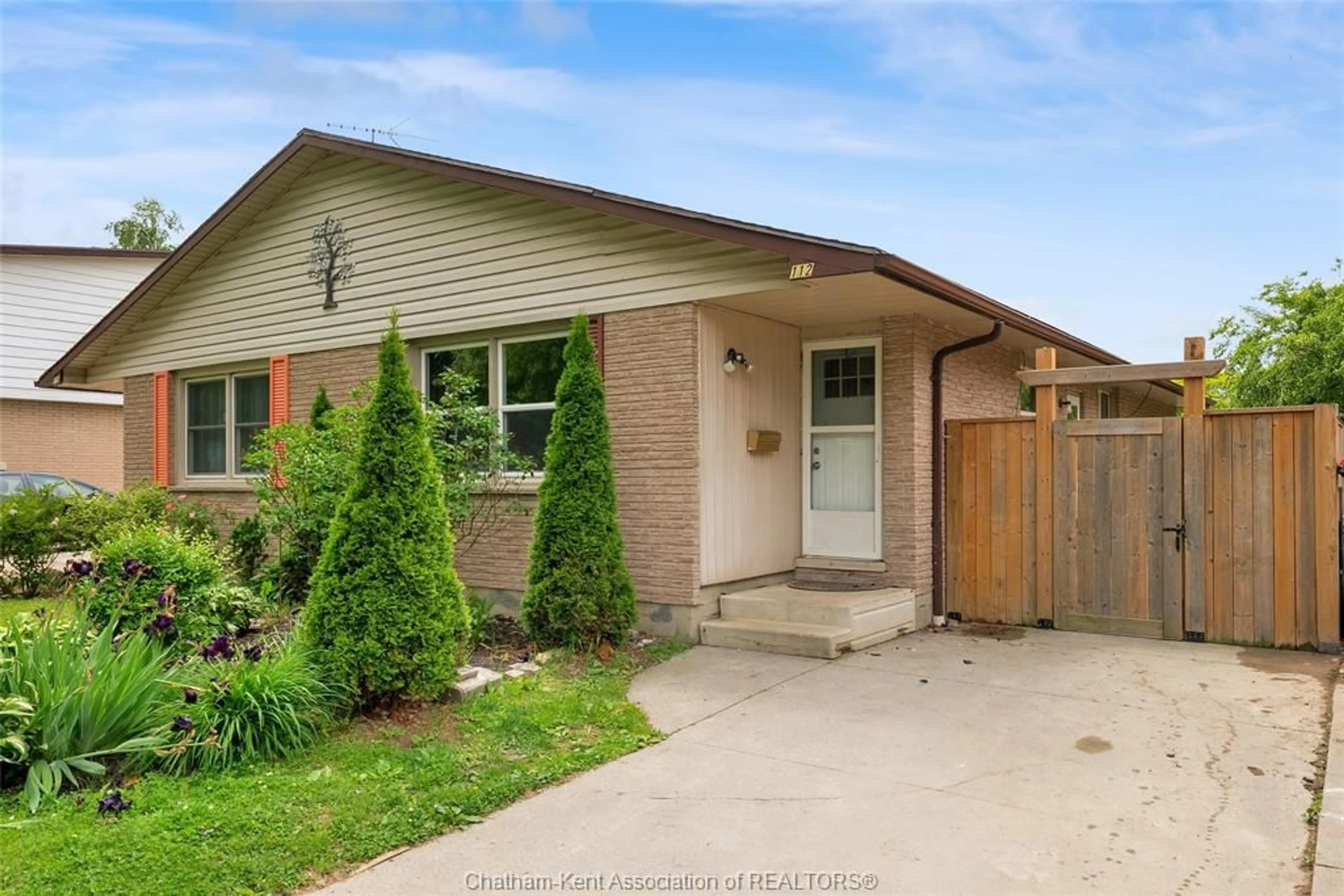 Home with brick exterior material, street for 112 Berry St, Chatham Ontario N7M 3B3