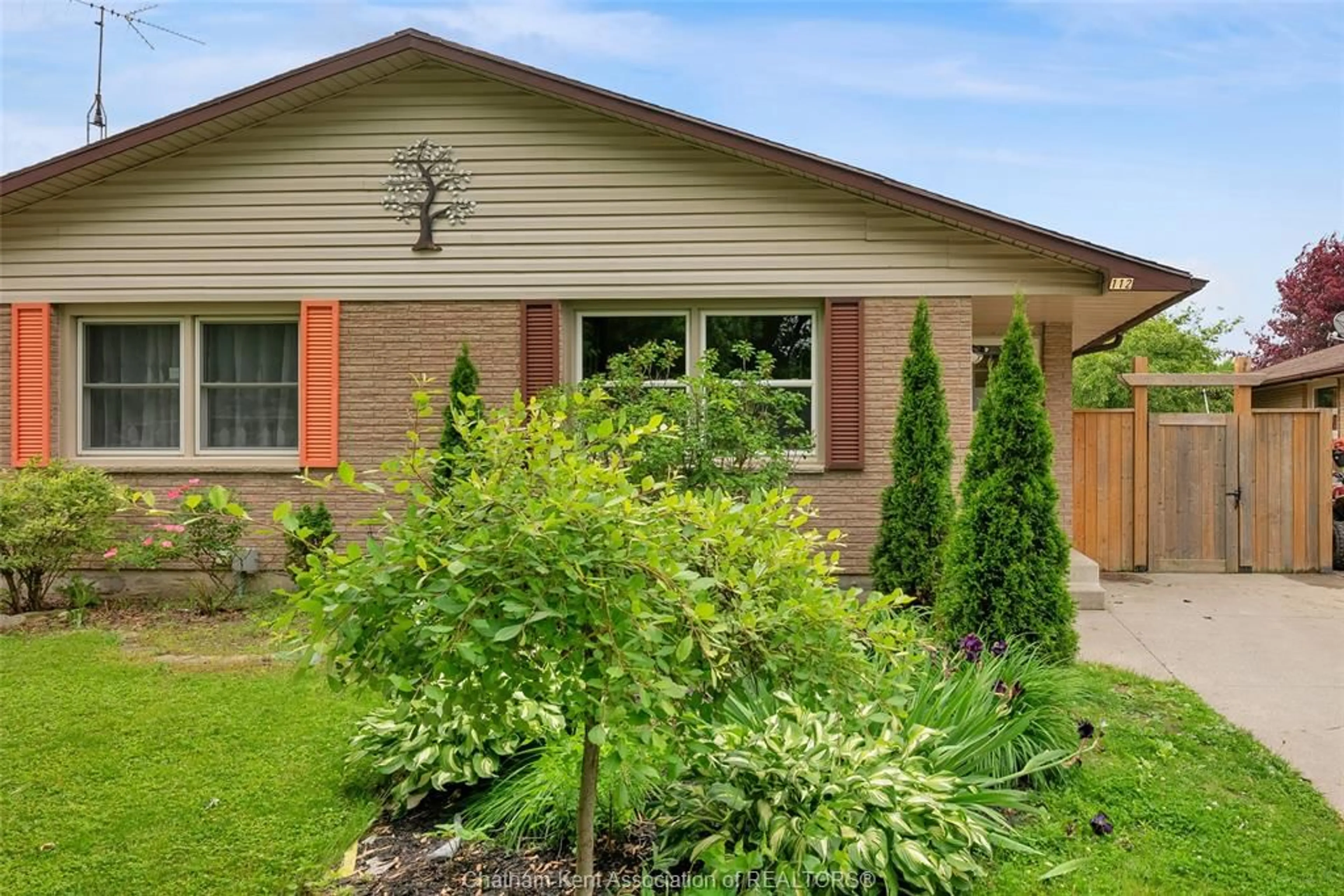 Home with brick exterior material, street for 112 Berry St, Chatham Ontario N7M 3B3