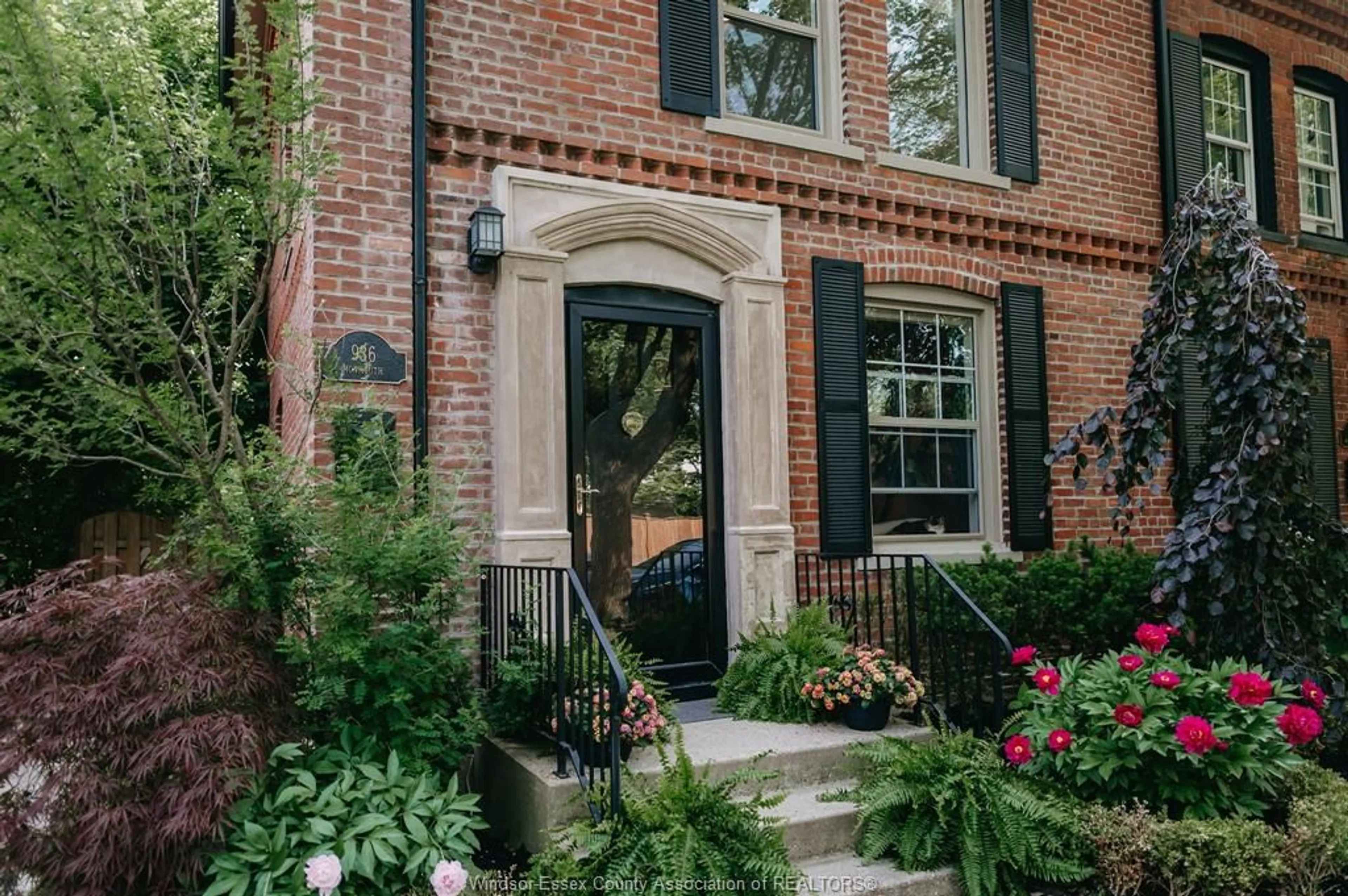Home with brick exterior material, street for 936 Monmouth Rd, Windsor Ontario N8Y 3L7