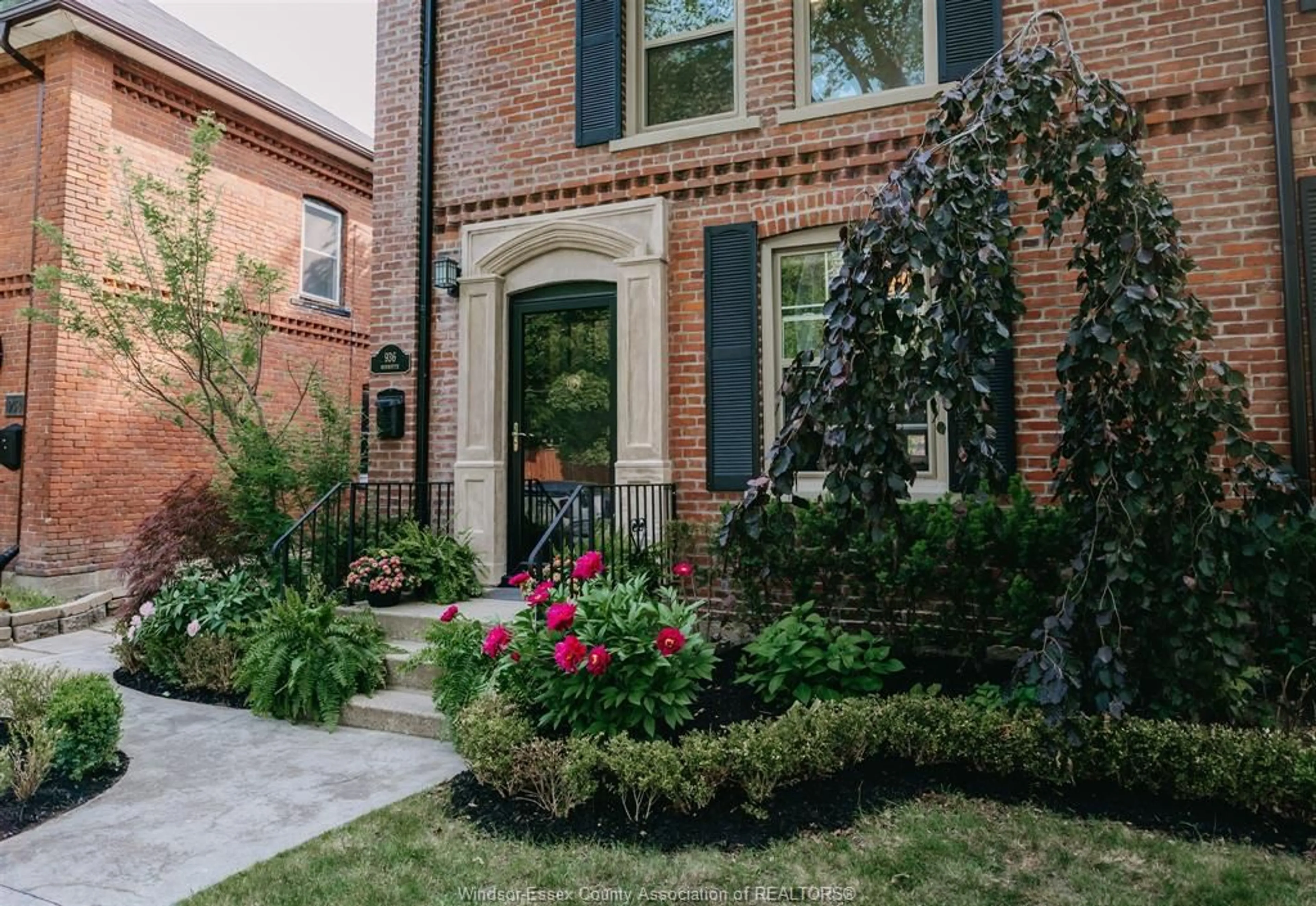 Home with brick exterior material, street for 936 Monmouth Rd, Windsor Ontario N8Y 3L7