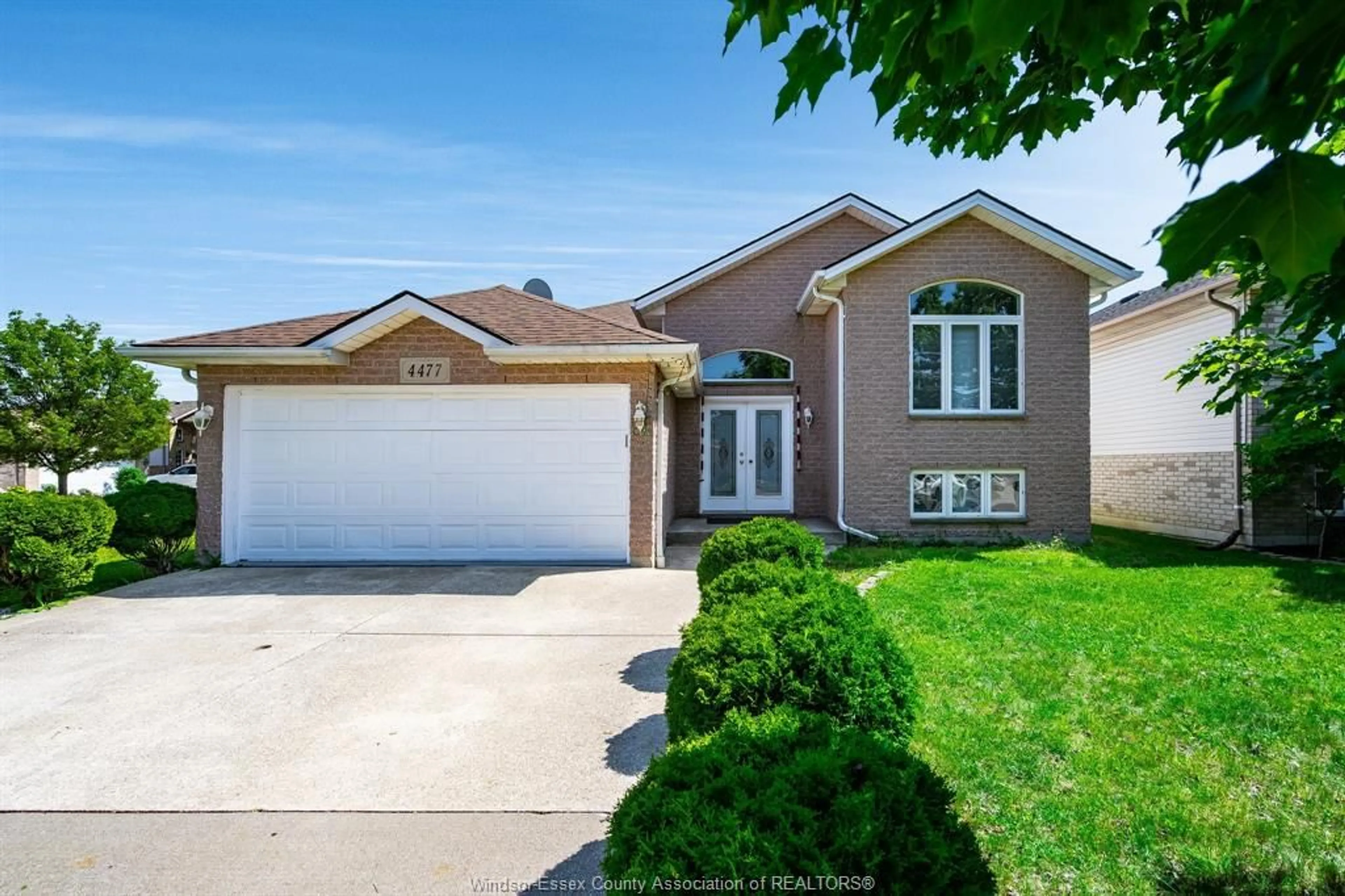 Home with vinyl exterior material, street for 4477 SPAGO Cres, Windsor Ontario N9G 2Z6