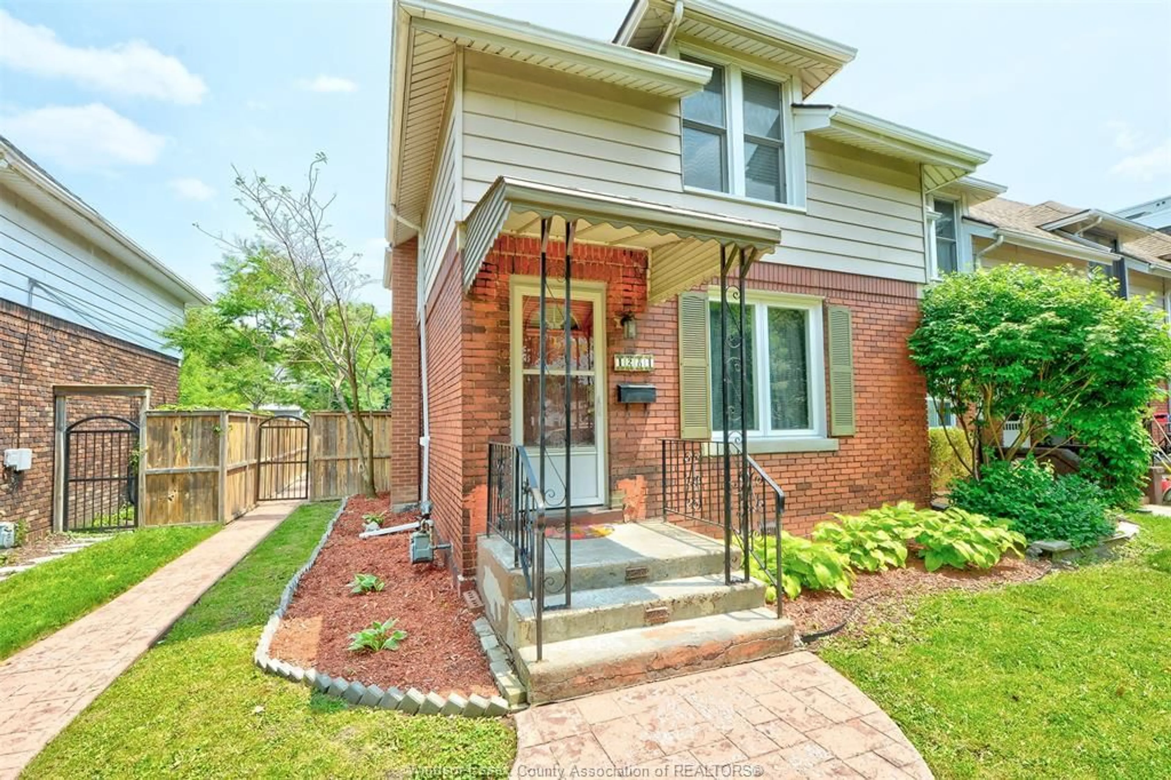 Home with brick exterior material, street for 1284 ARGYLE Rd, Windsor Ontario N8K 3K4