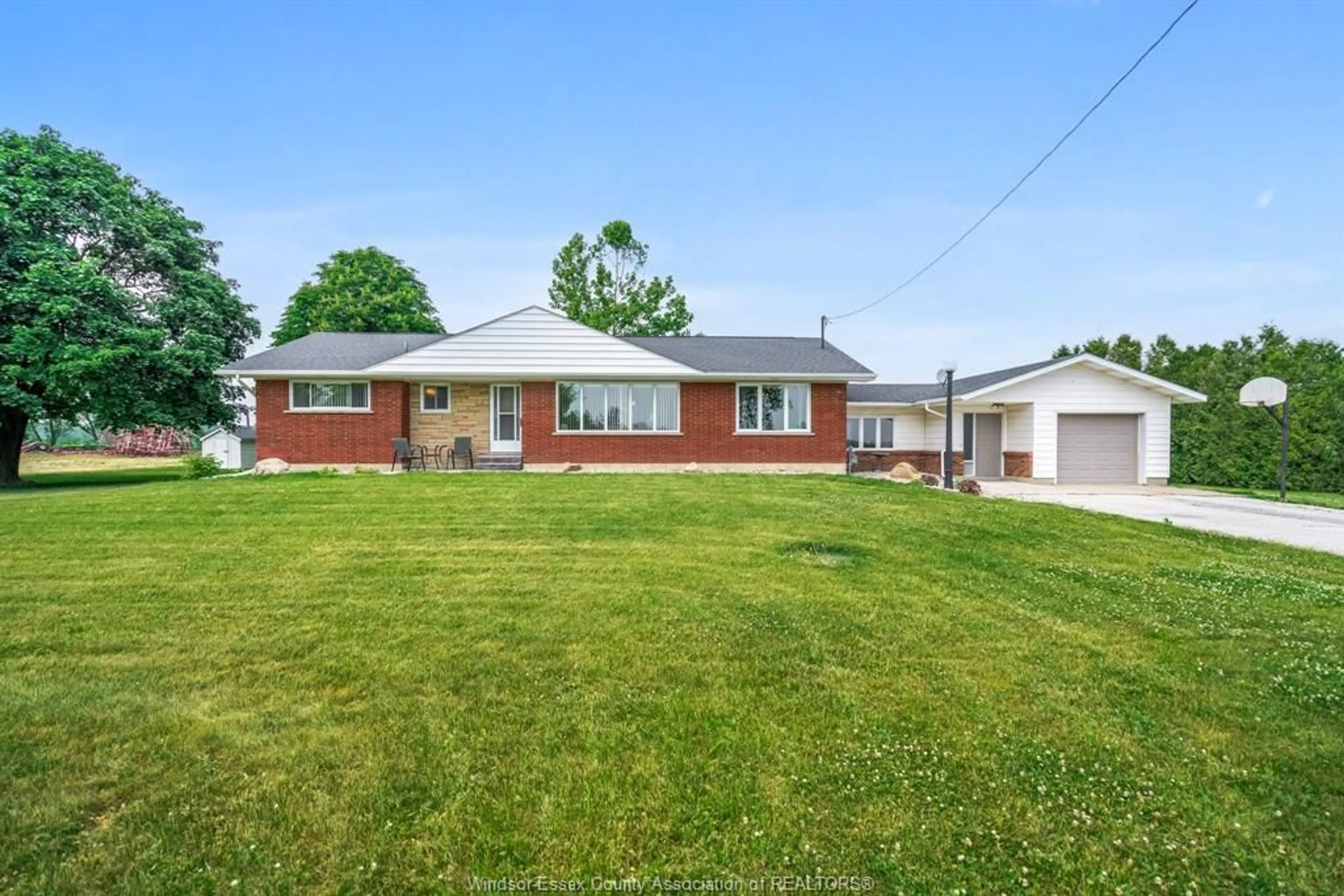 A pic from outside/outdoor area/front of a property/back of a property/a pic from drone, street for 269 Road 7, Kingsville Ontario N0P 2G0