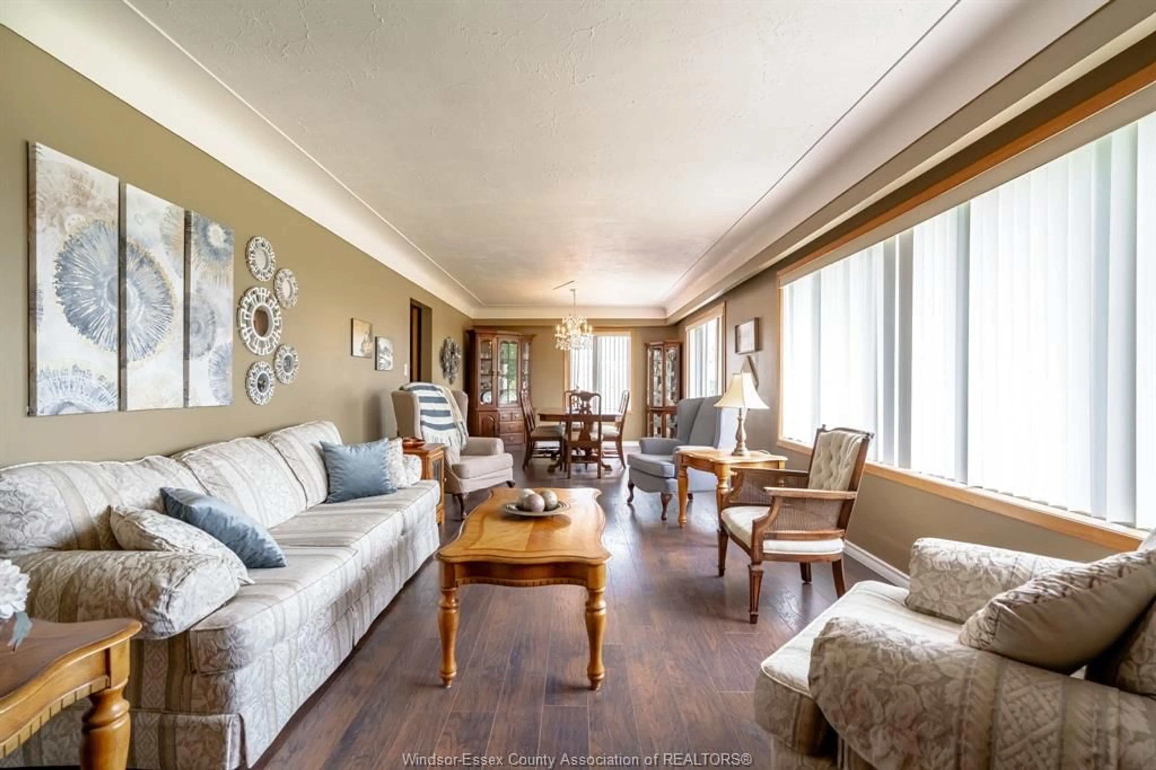 Living room with furniture, wood/laminate floor for 269 Road 7, Kingsville Ontario N0P 2G0