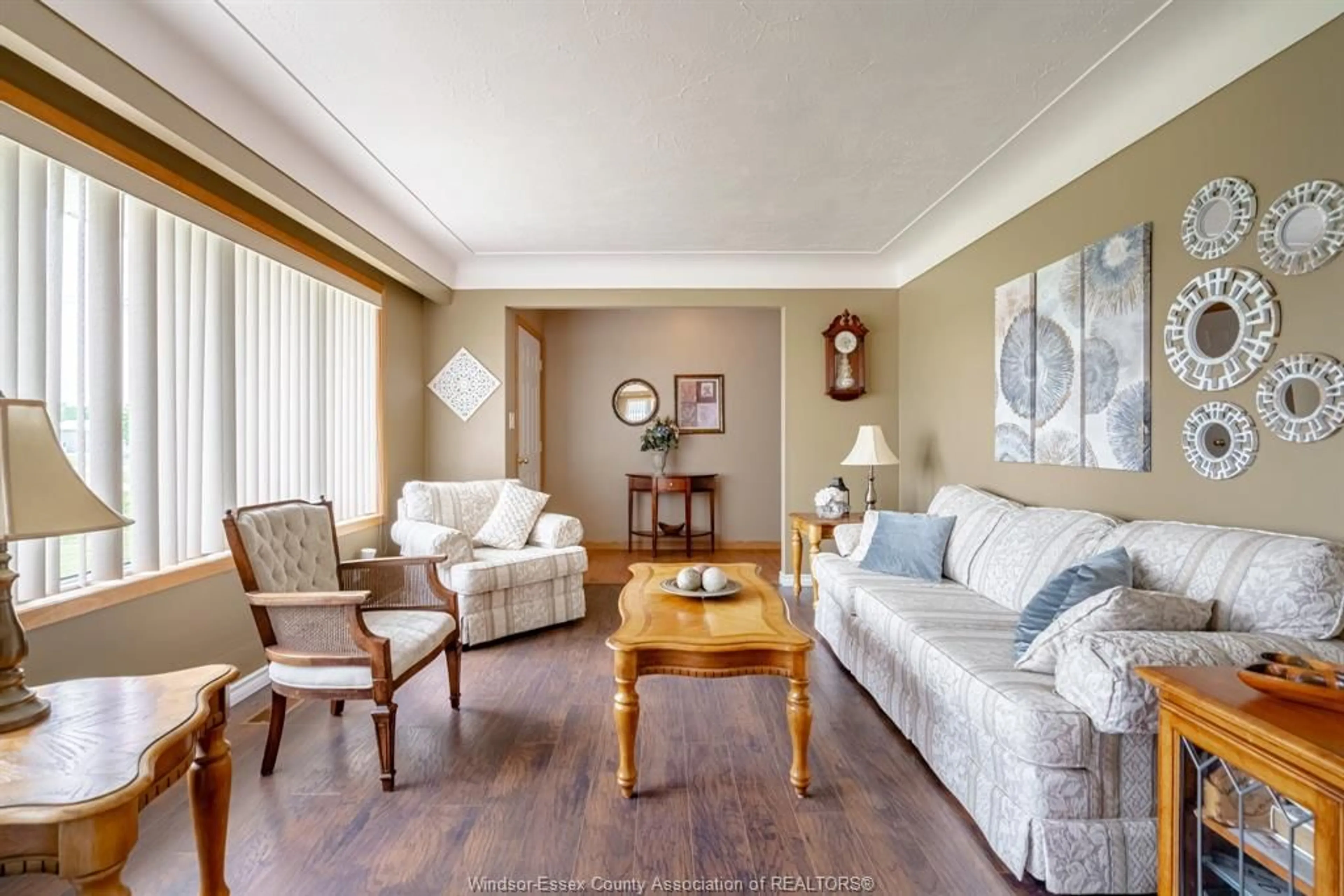 Living room with furniture, wood/laminate floor for 269 Road 7, Kingsville Ontario N0P 2G0