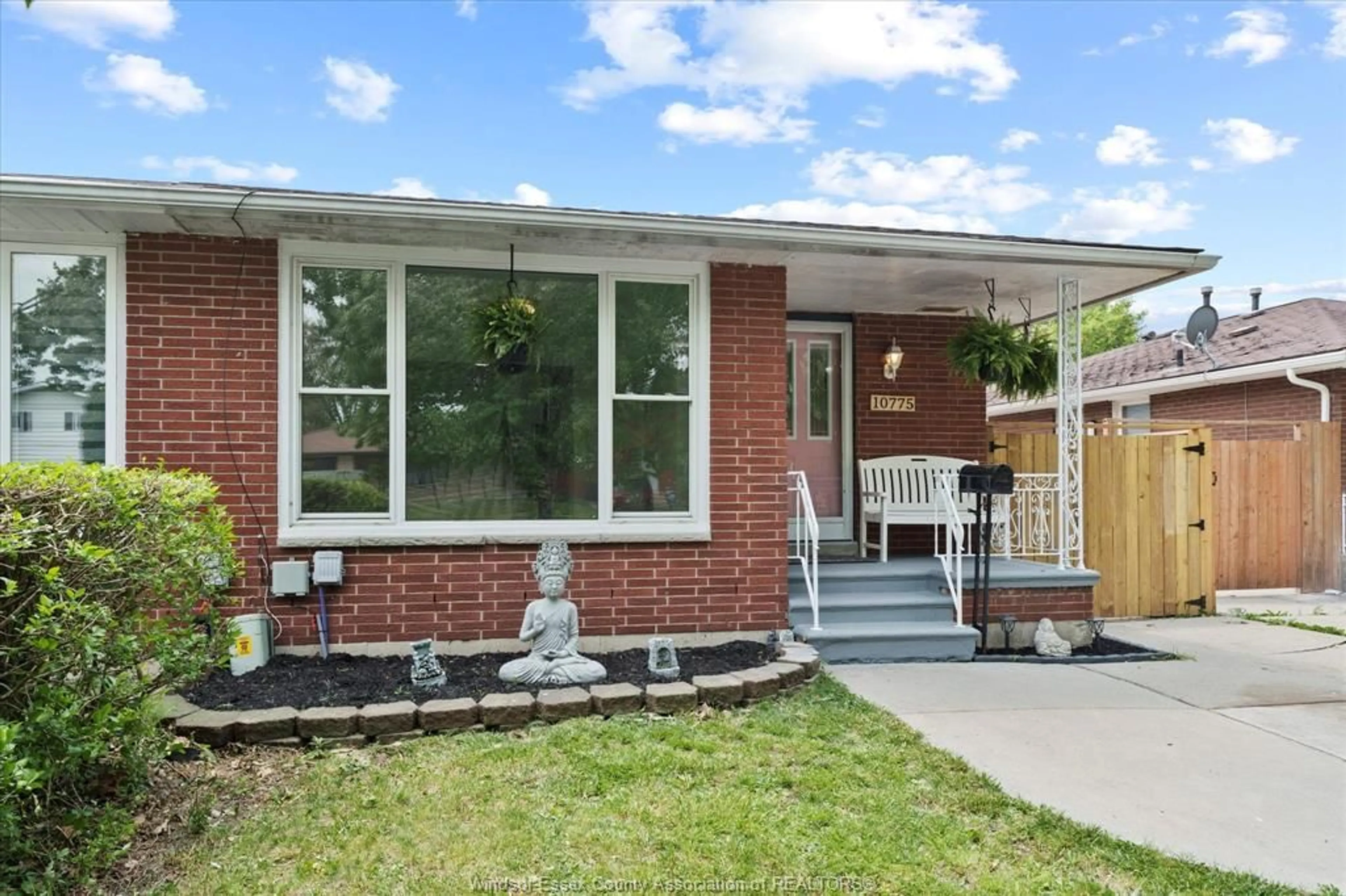 Home with brick exterior material, street for 10775 Atwater, Windsor Ontario N8R 1N8