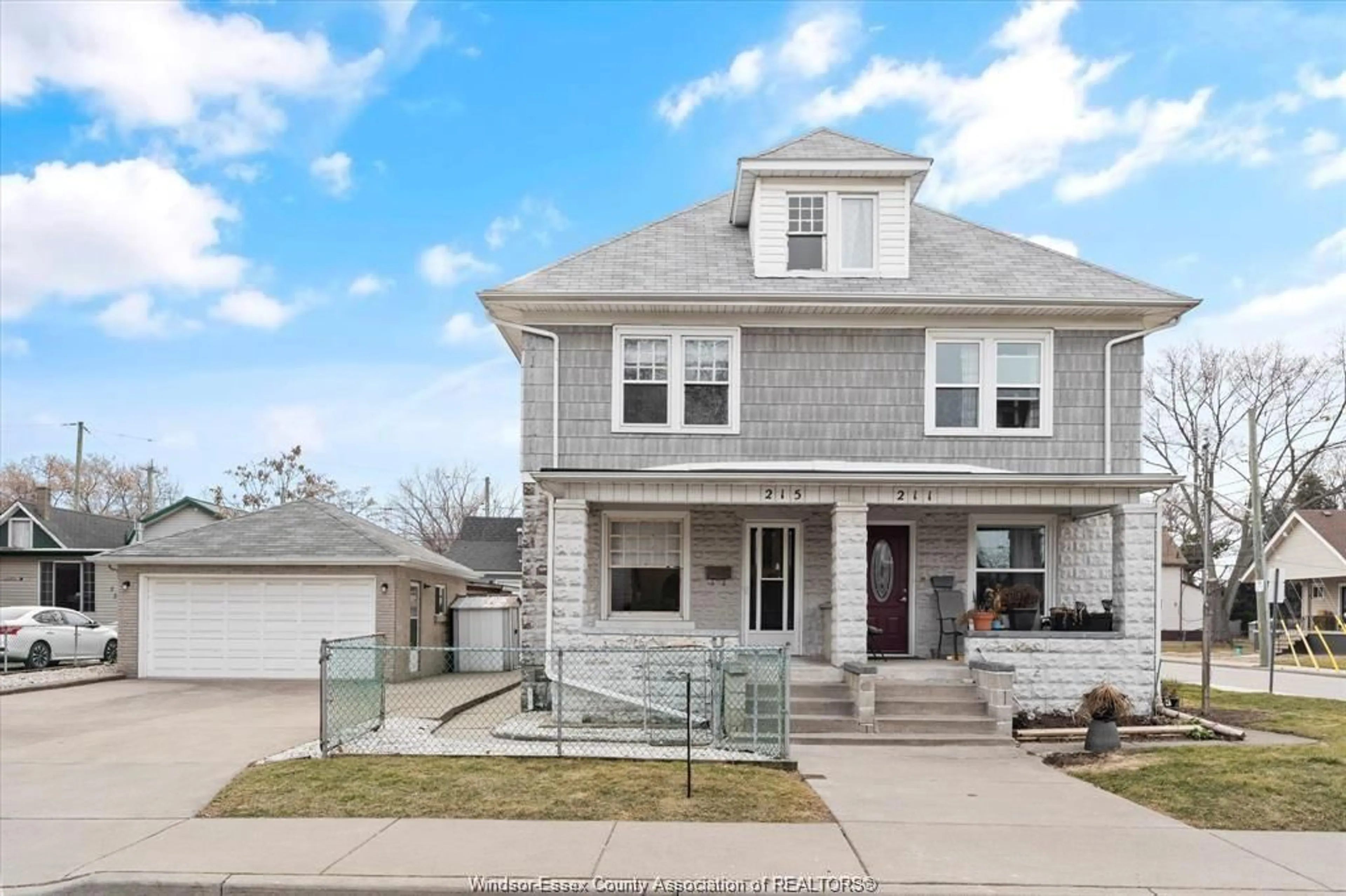 Home with vinyl exterior material, street for 215 PIERRE Ave, Windsor Ontario N9A 2J6