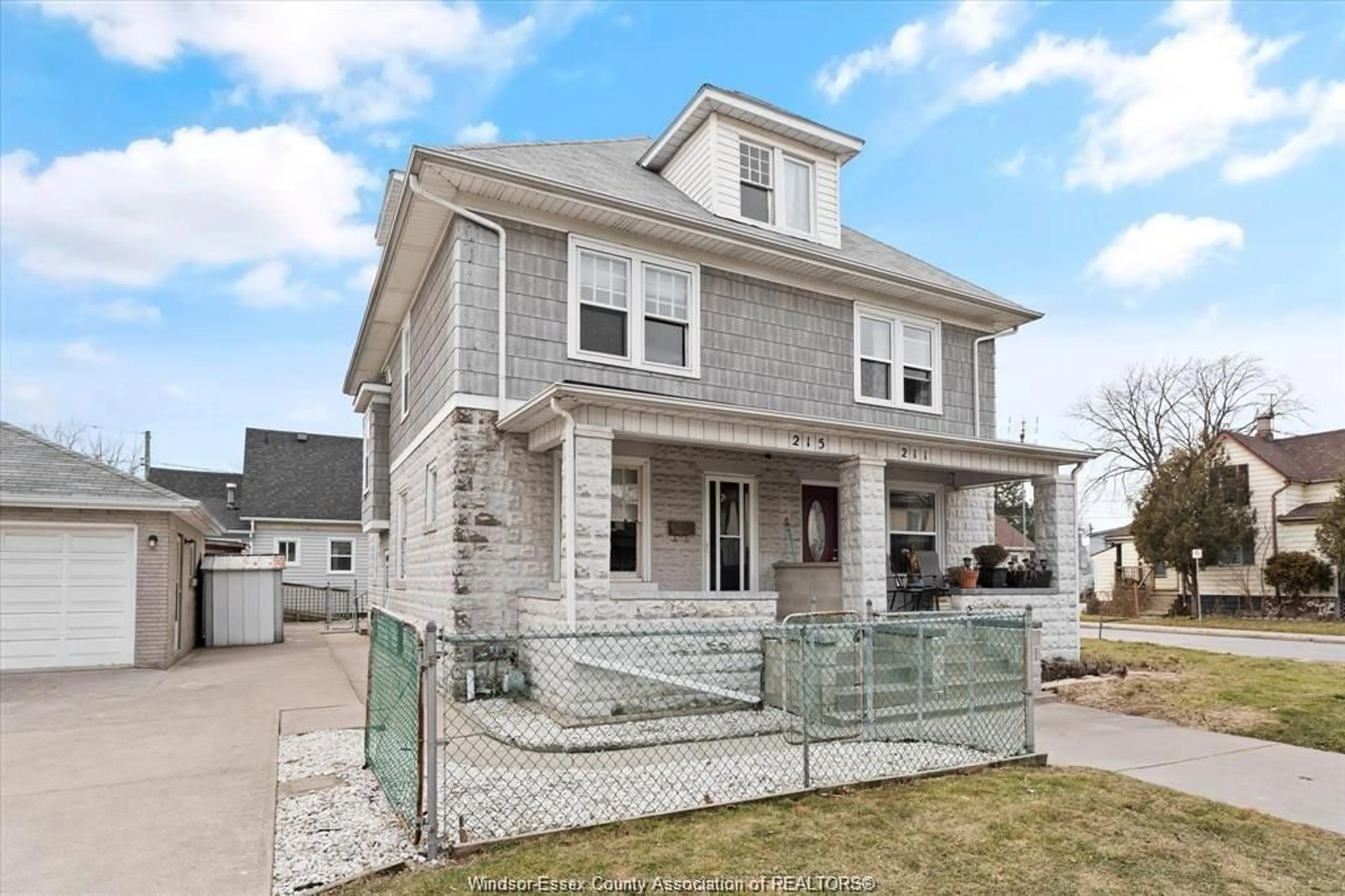 Home with vinyl exterior material, street for 215 PIERRE Ave, Windsor Ontario N9A 2J6