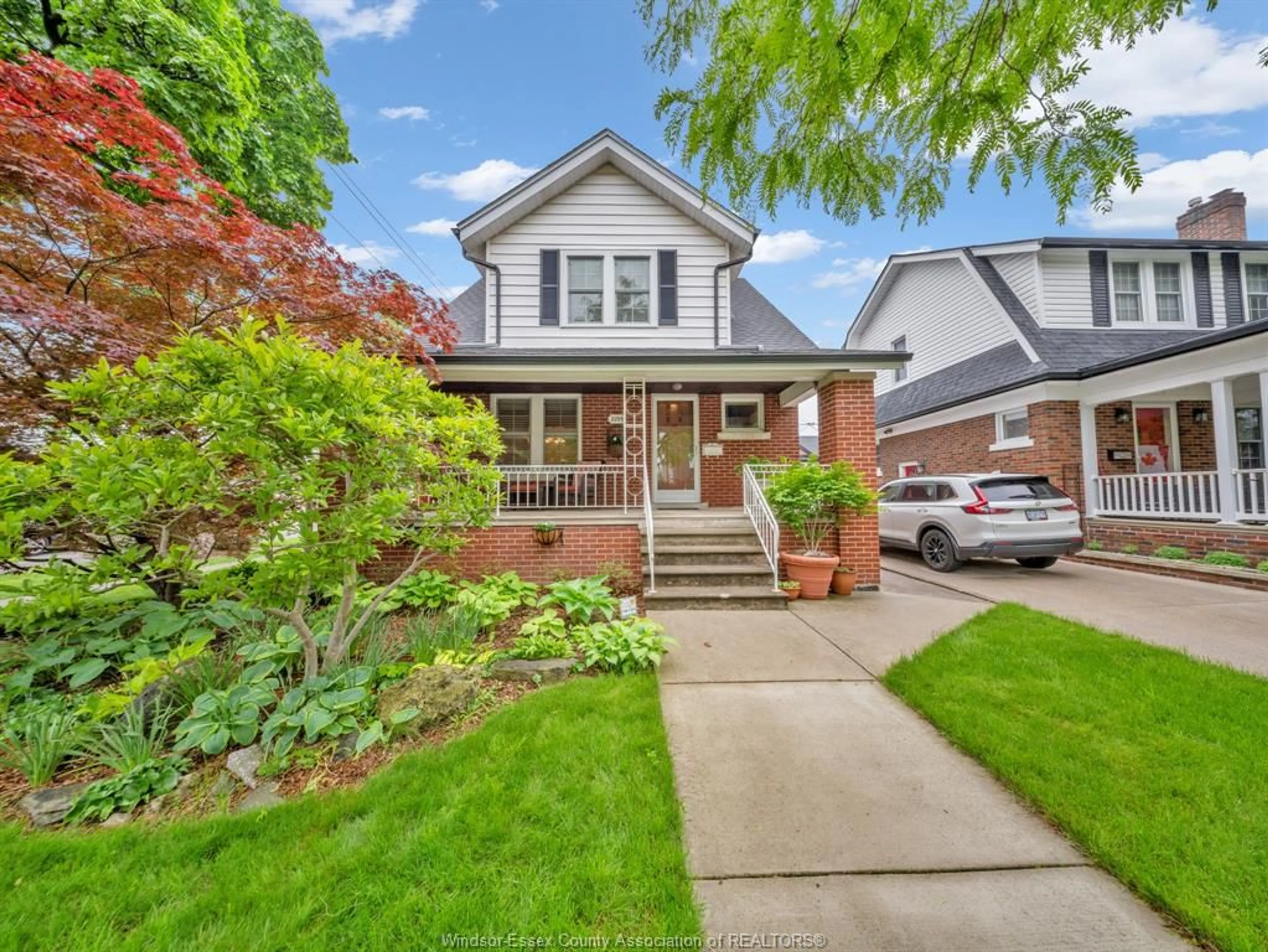 Home with brick exterior material, street for 2295 CHILVER Rd, Windsor Ontario N8W 2V4