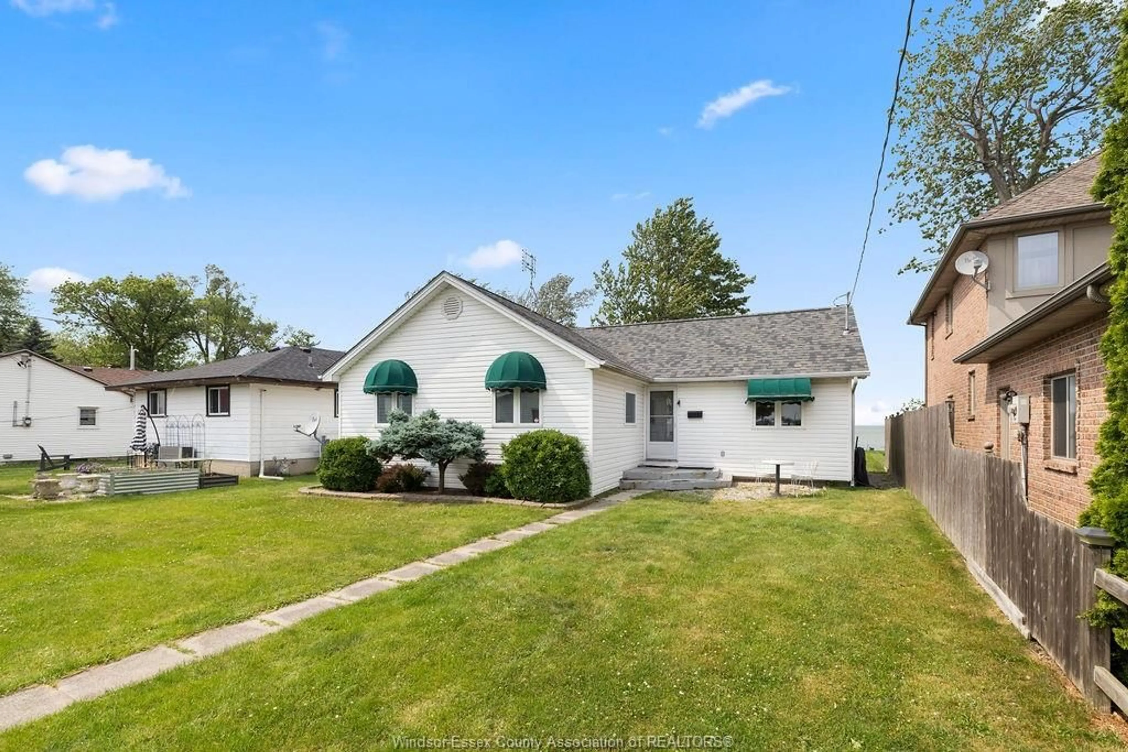Home with vinyl exterior material, street for 4802 ST. CLAIR Rd, Stoney Point Ontario N0R 1N0